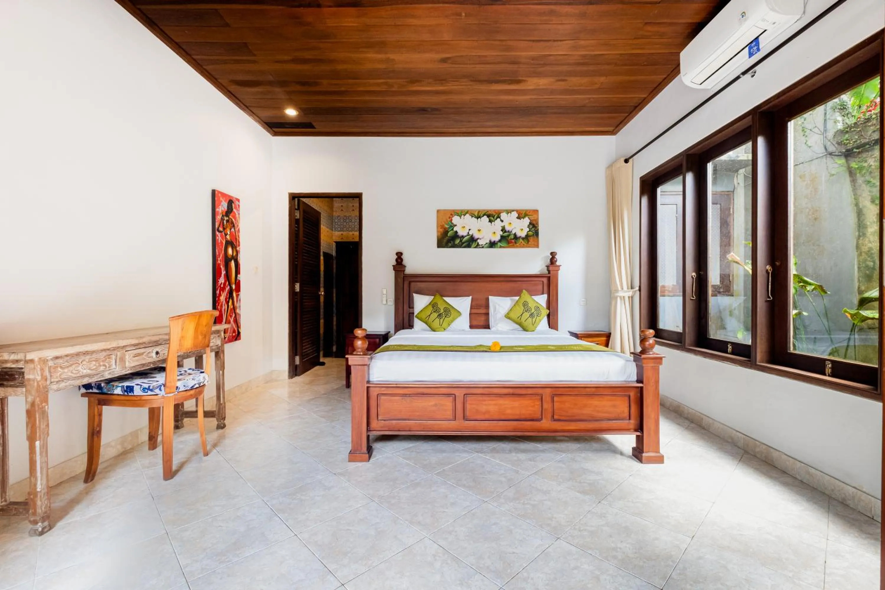 Bed in Pukakoo Villas and Suite by Supala