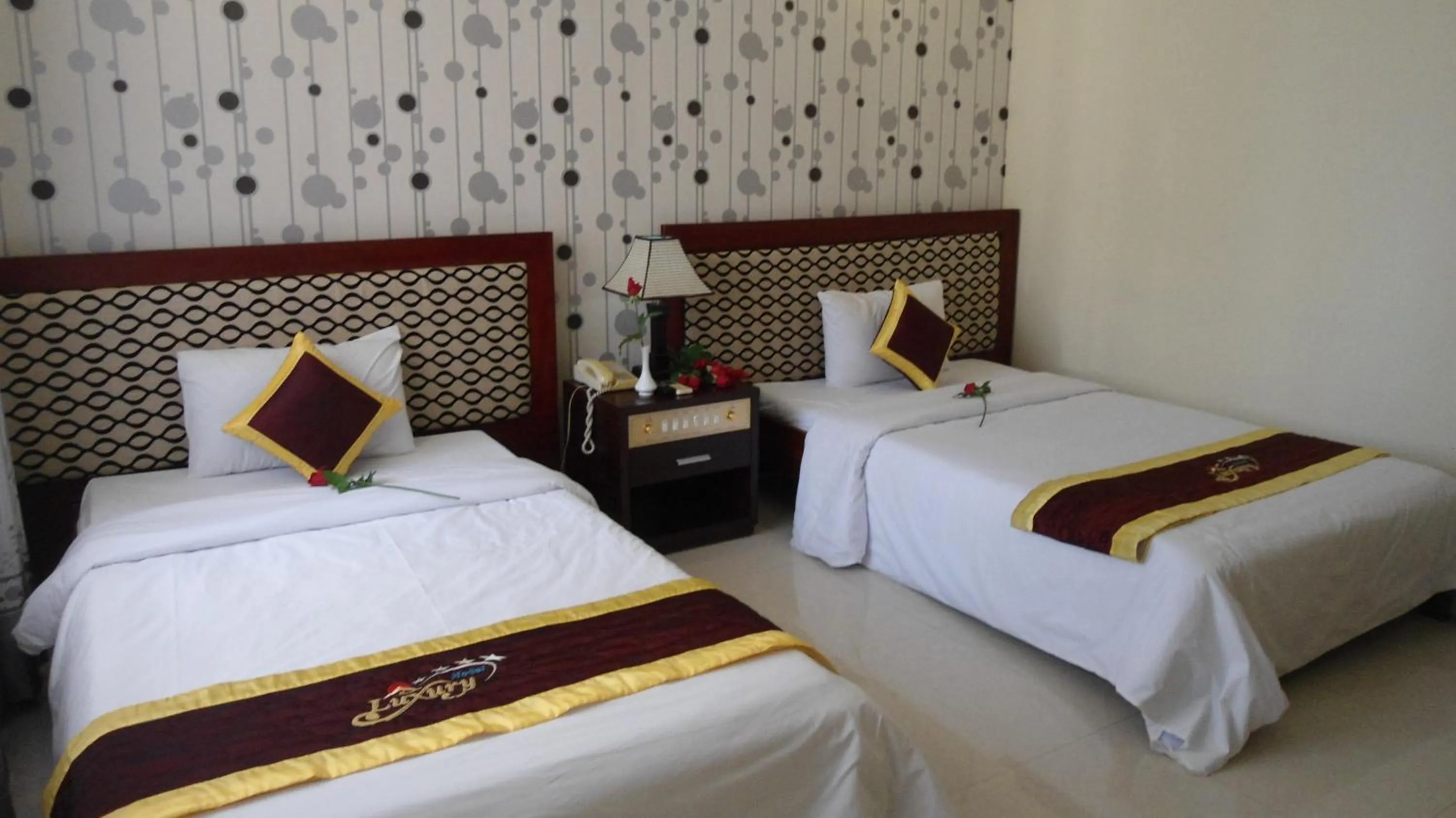 Bed in Luxury Nha Trang Hotel