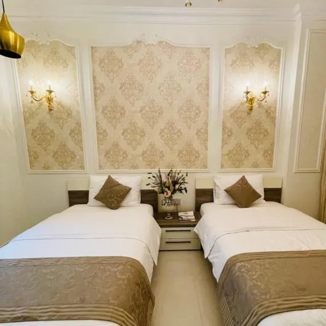 Bed in A'Sinamar Hotel Apartment