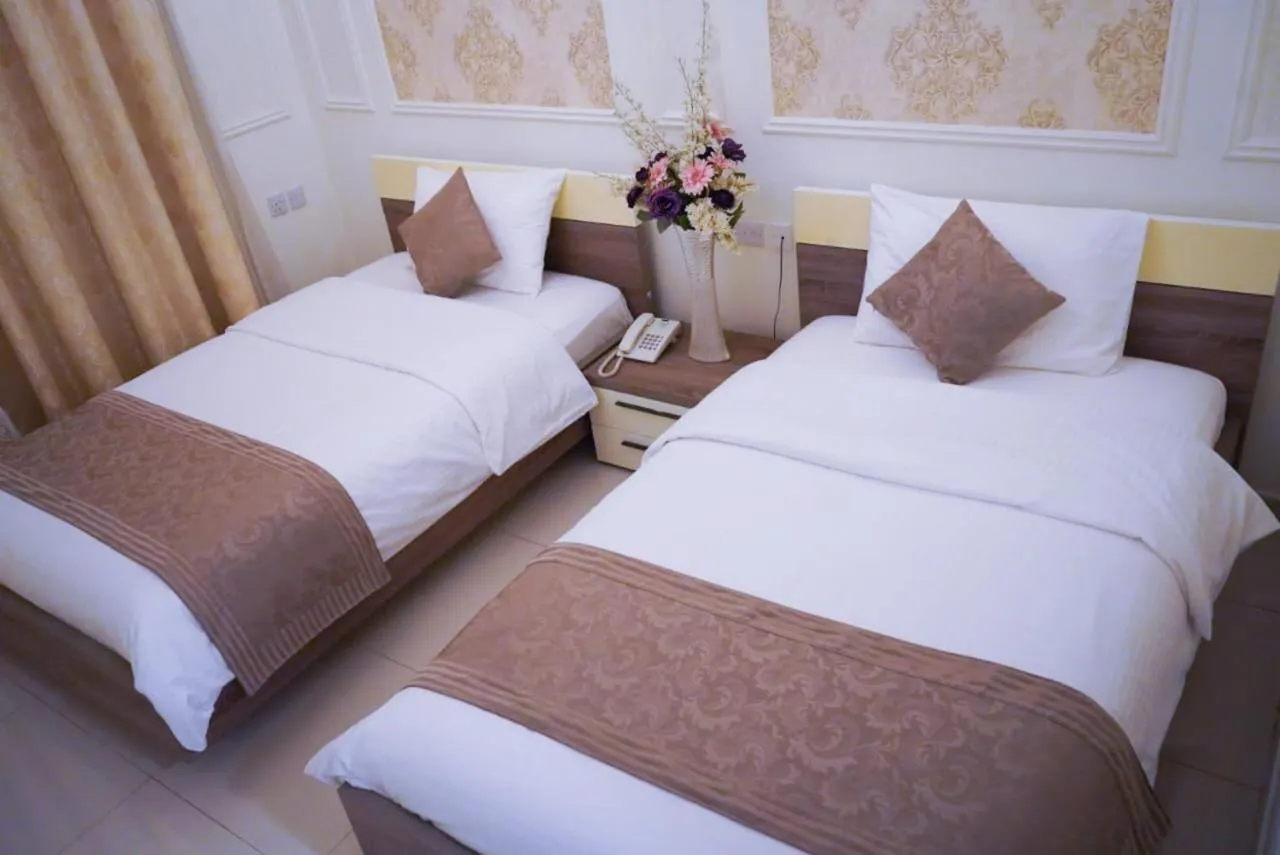 Bed in A'Sinamar Hotel Apartment