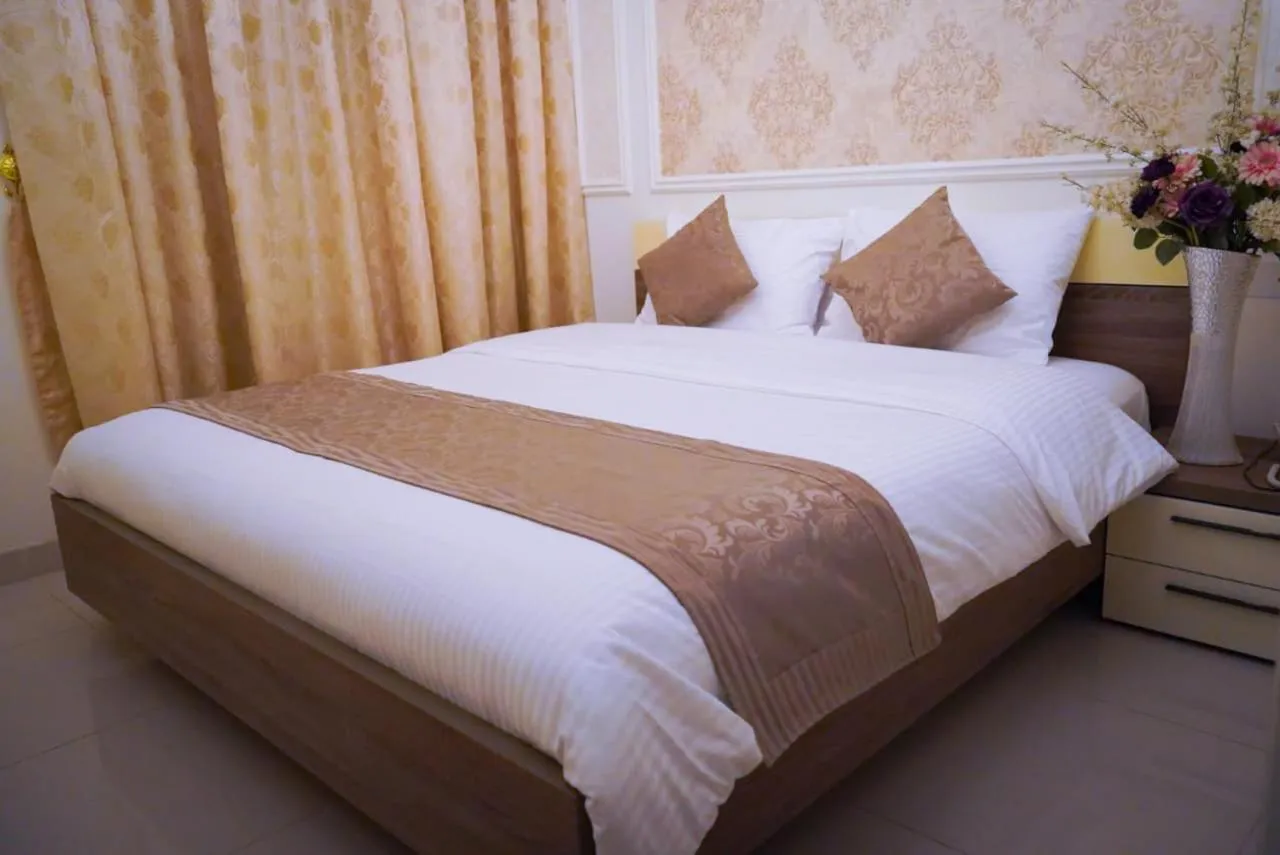 Bed in A'Sinamar Hotel Apartment