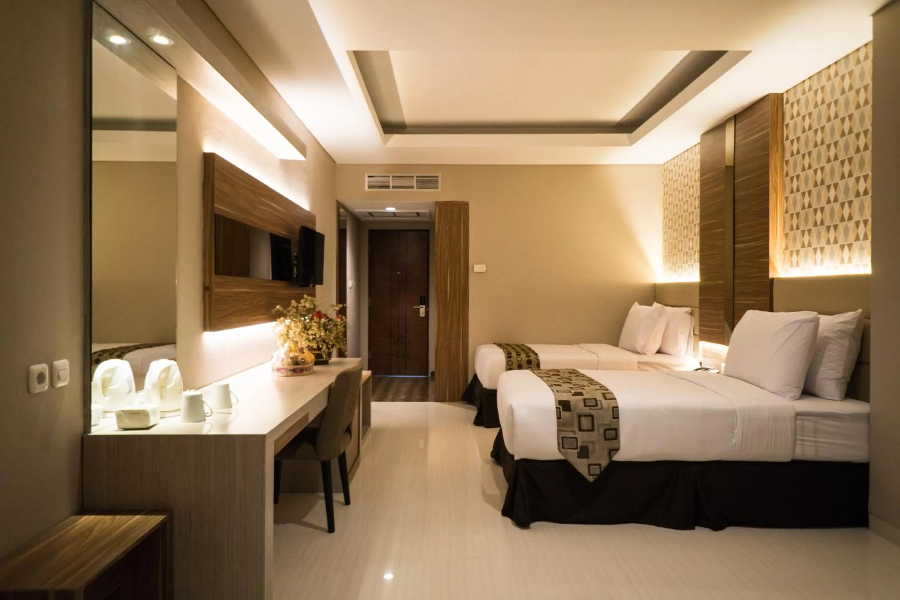 Photo of the whole room, Bed in Novena Hotel Bandung