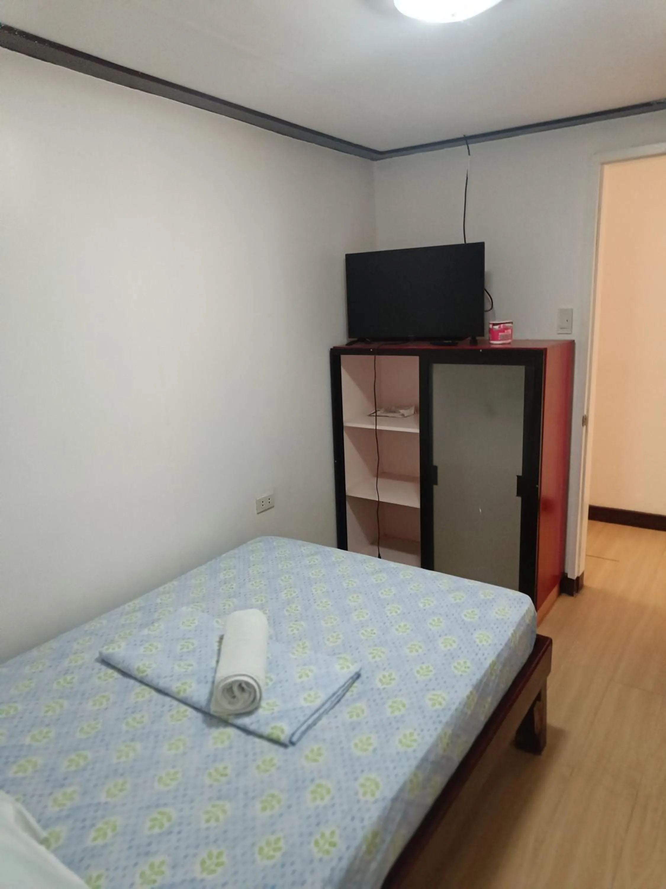 Bed in Catalina`s Inn family room