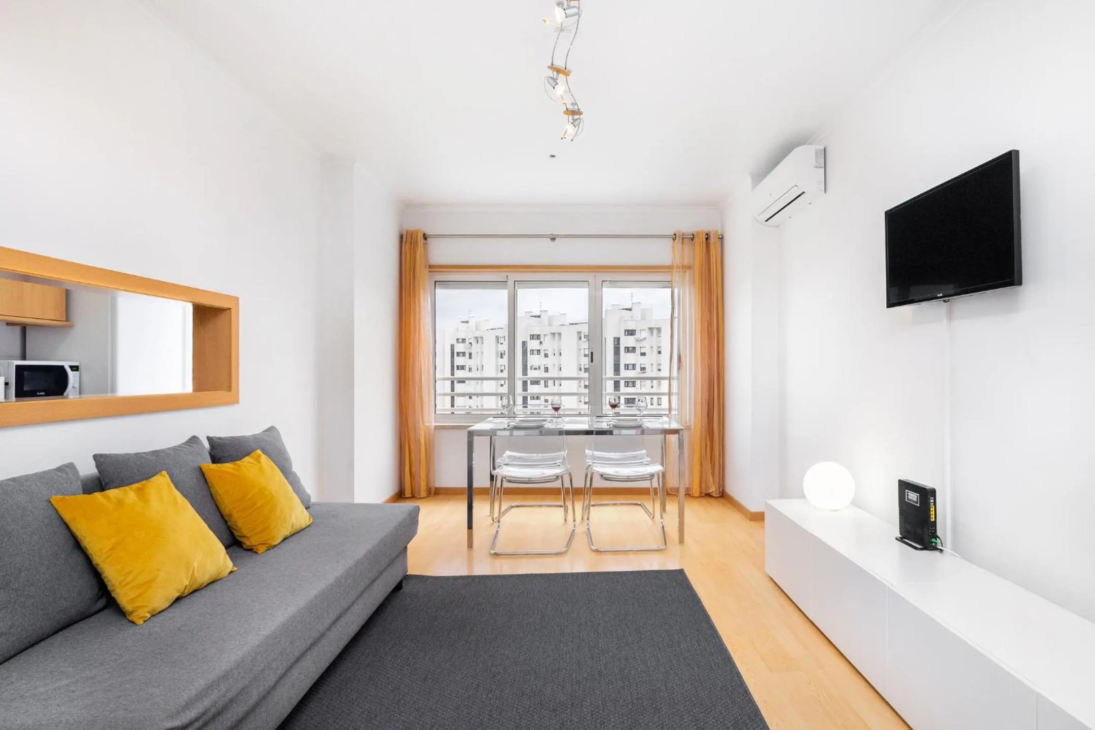 Living room, Bed in Lisboa, Cidade, Elegant Apartment with Air Cond, Free WIFI and Near Metro, by IG