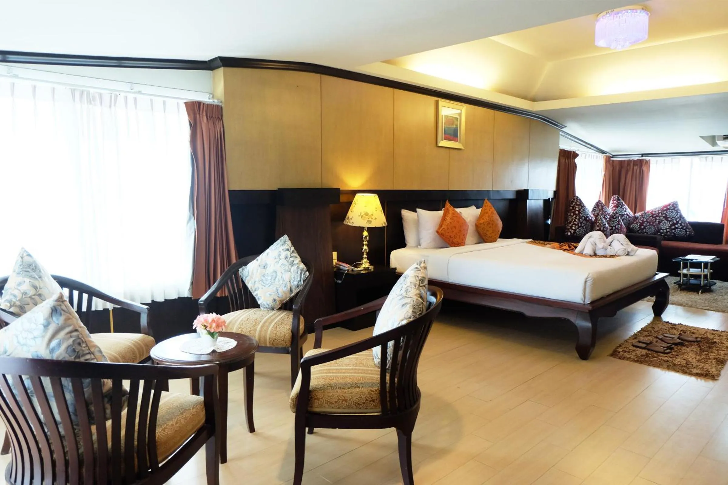 Seating area, Bed in Grand Hill Resort and Spa