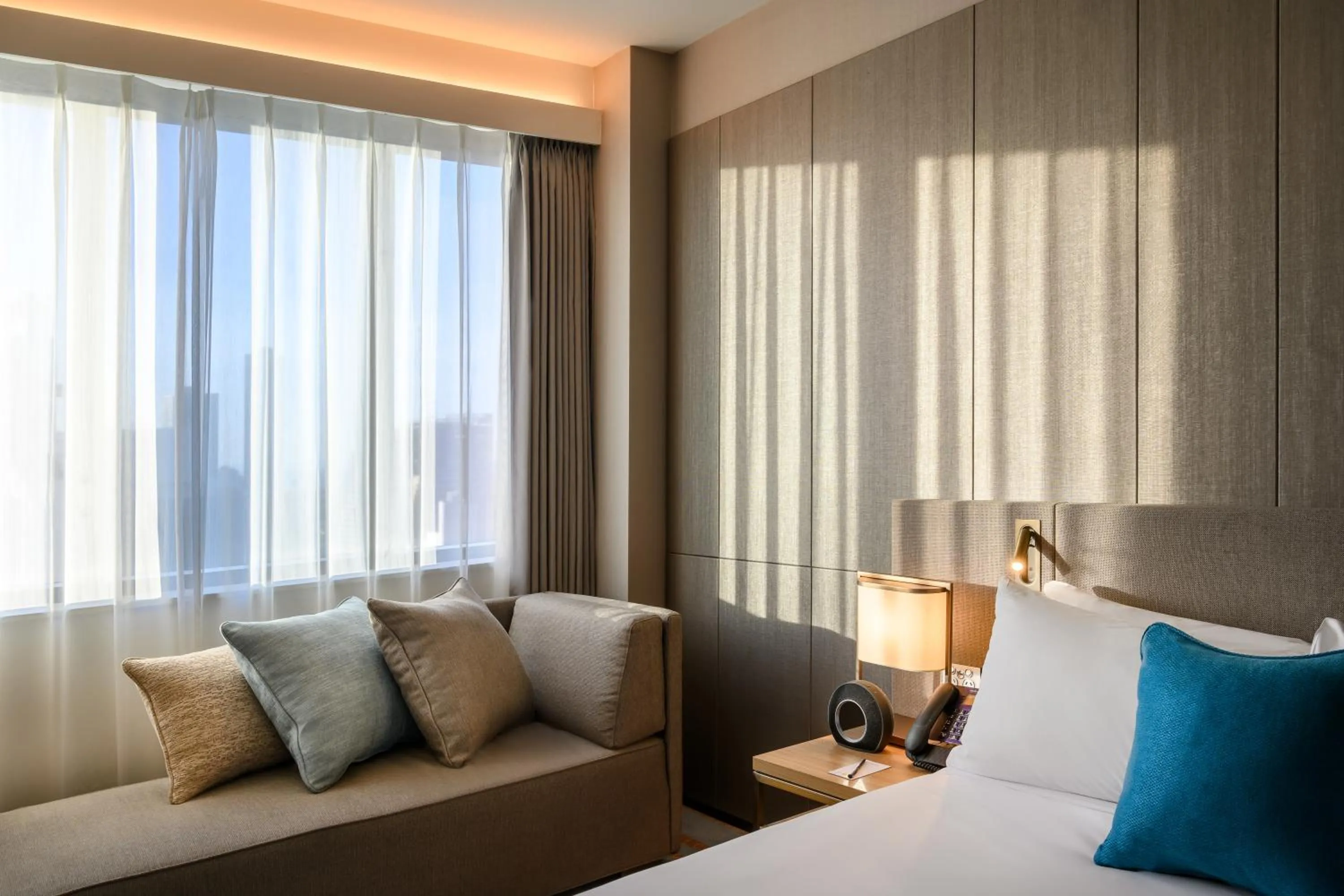 Living room, Bed in Novotel Melbourne Central