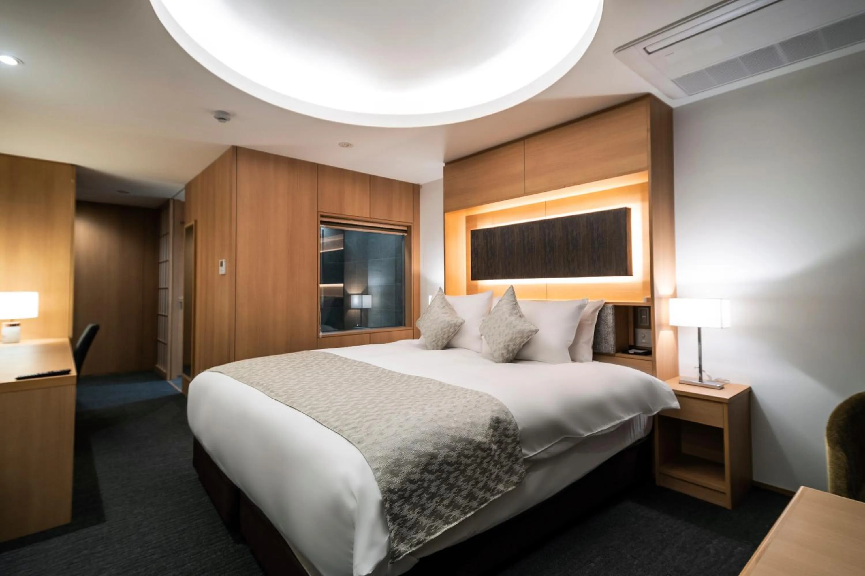 Bed in Kyoto Shijo Takakura Hotel Grandereverie