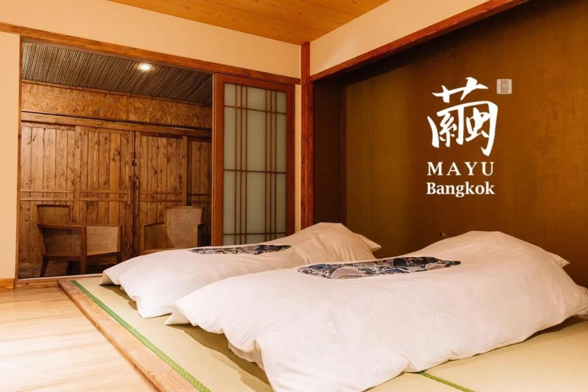Bed in MAYU Bangkok Japanese Style Hotel