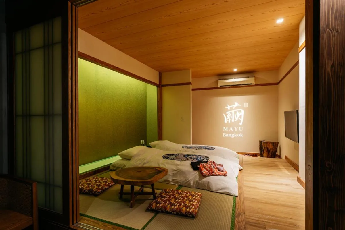Bed in MAYU Bangkok Japanese Style Hotel