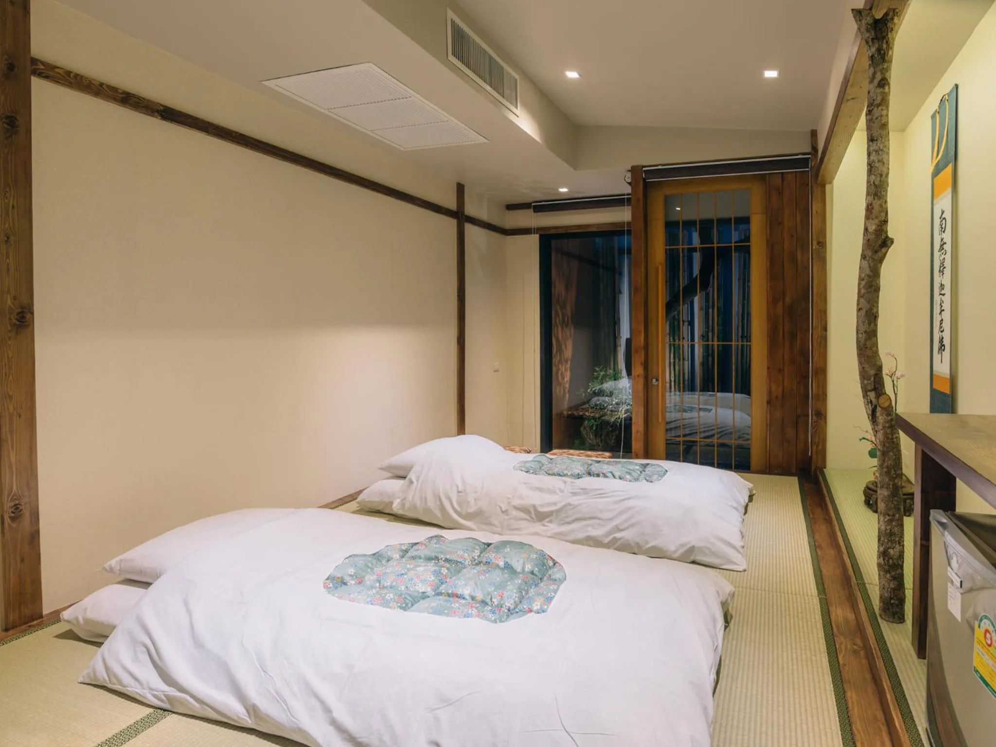 Bed in MAYU Bangkok Japanese Style Hotel