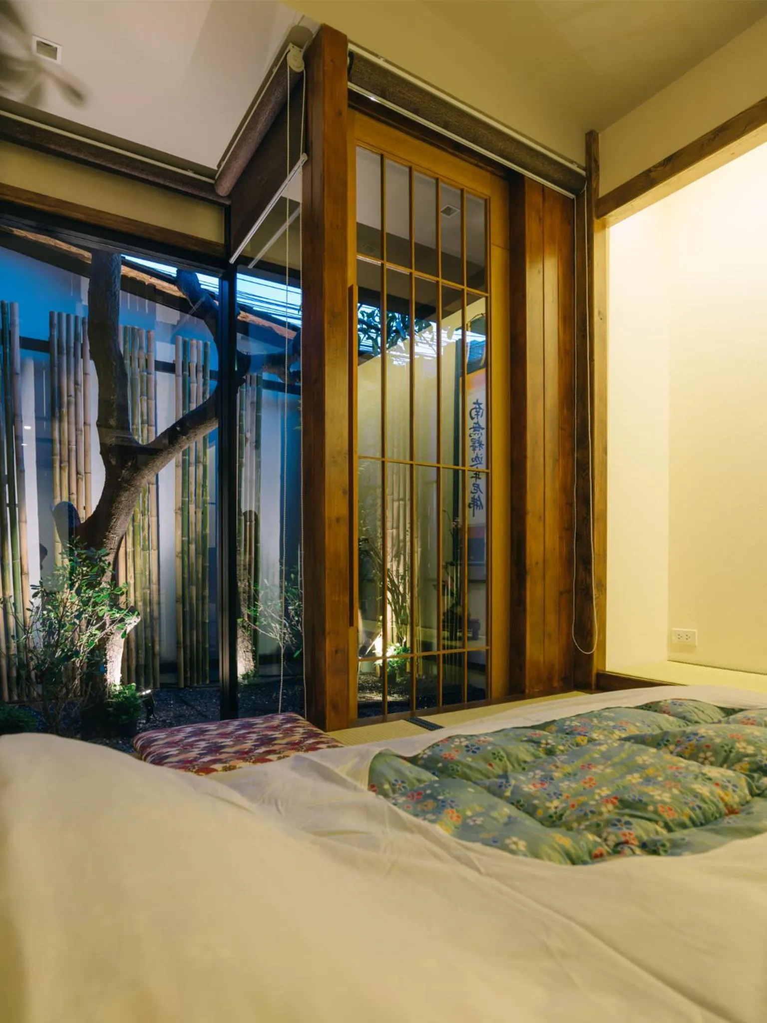 Bed in MAYU Bangkok Japanese Style Hotel