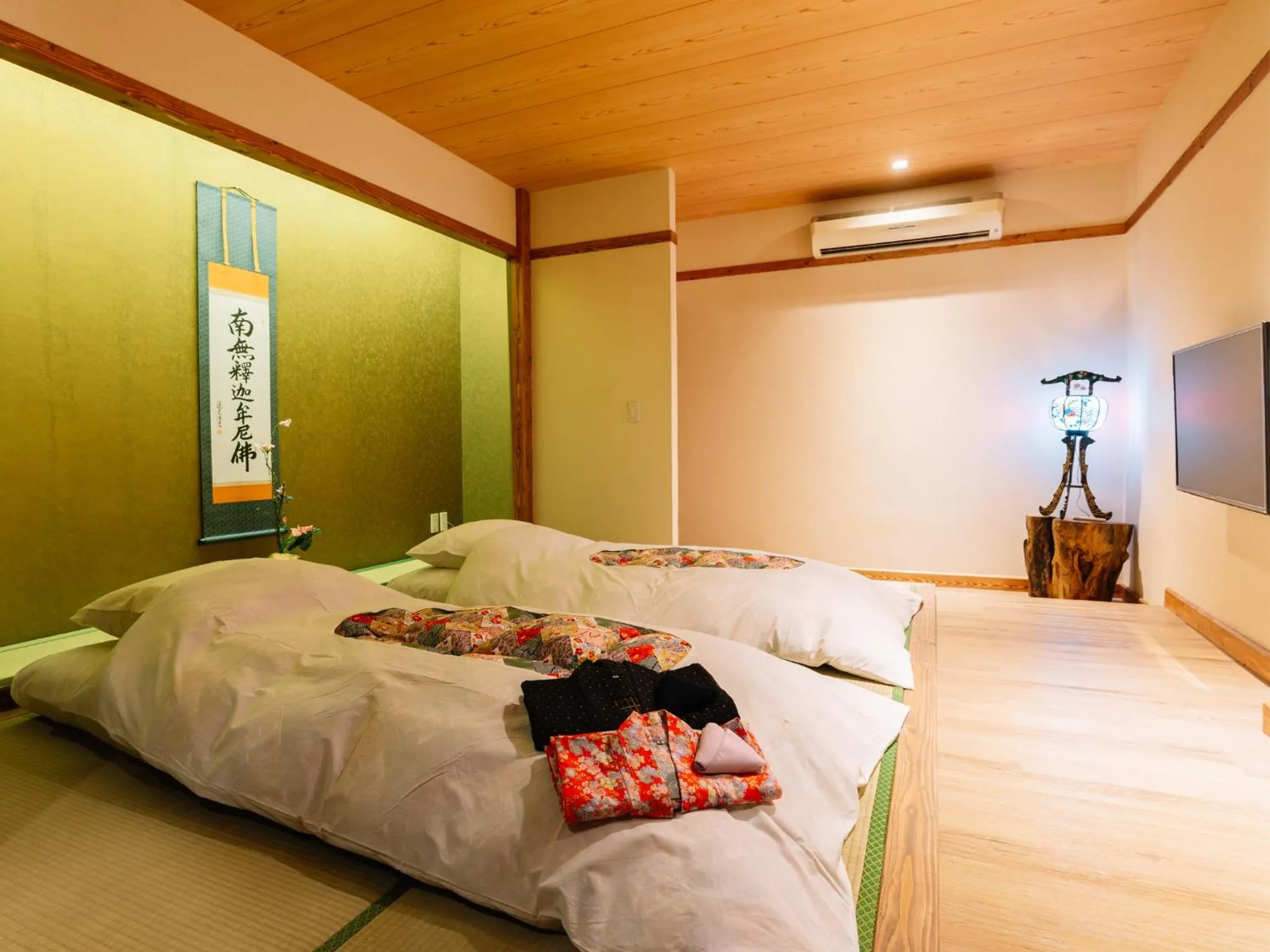 Bed in MAYU Bangkok Japanese Style Hotel