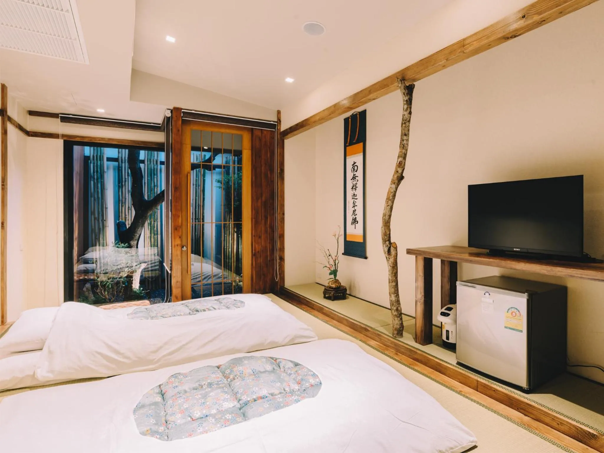 Bed in MAYU Bangkok Japanese Style Hotel