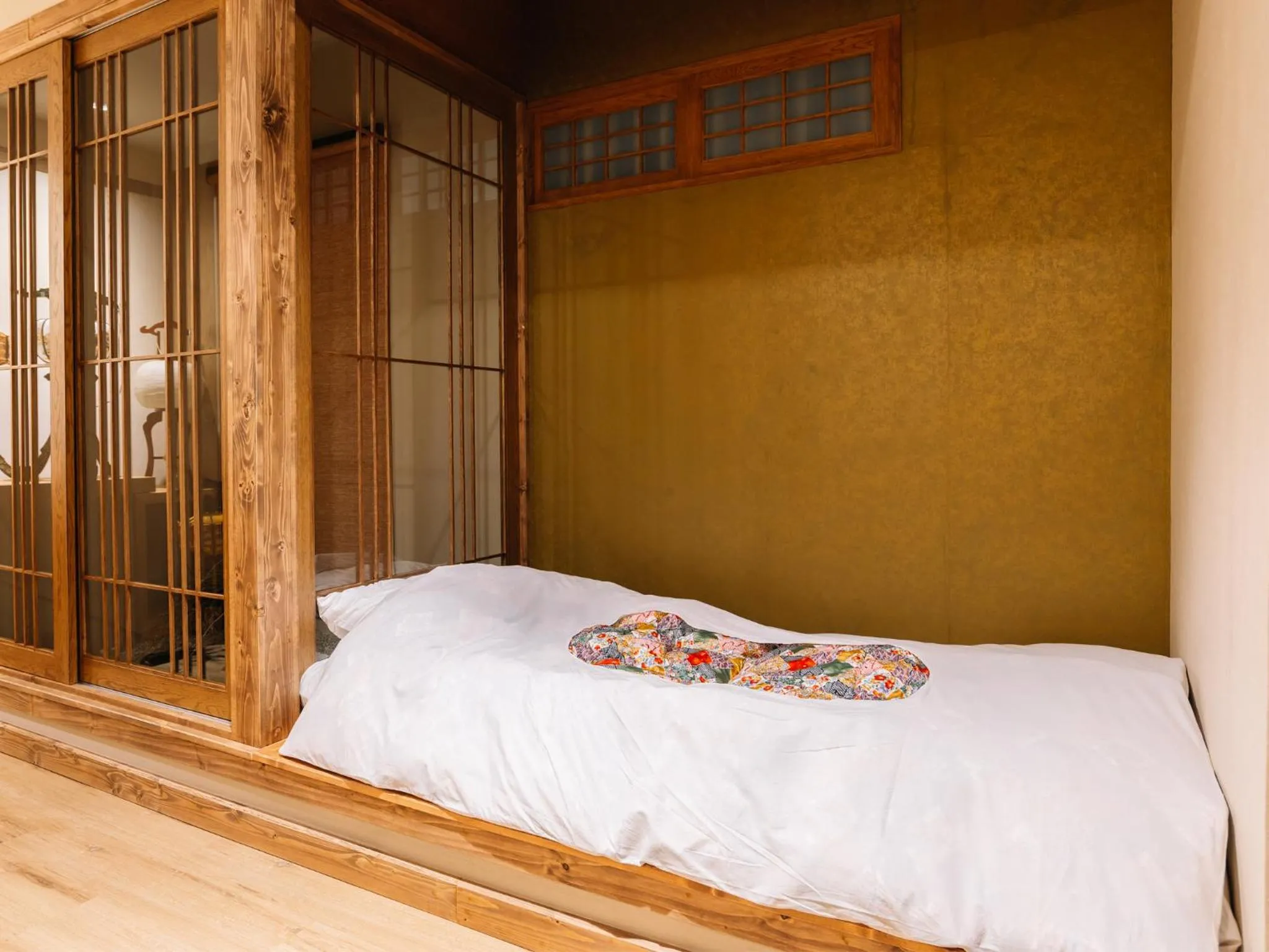 Bed in MAYU Bangkok Japanese Style Hotel