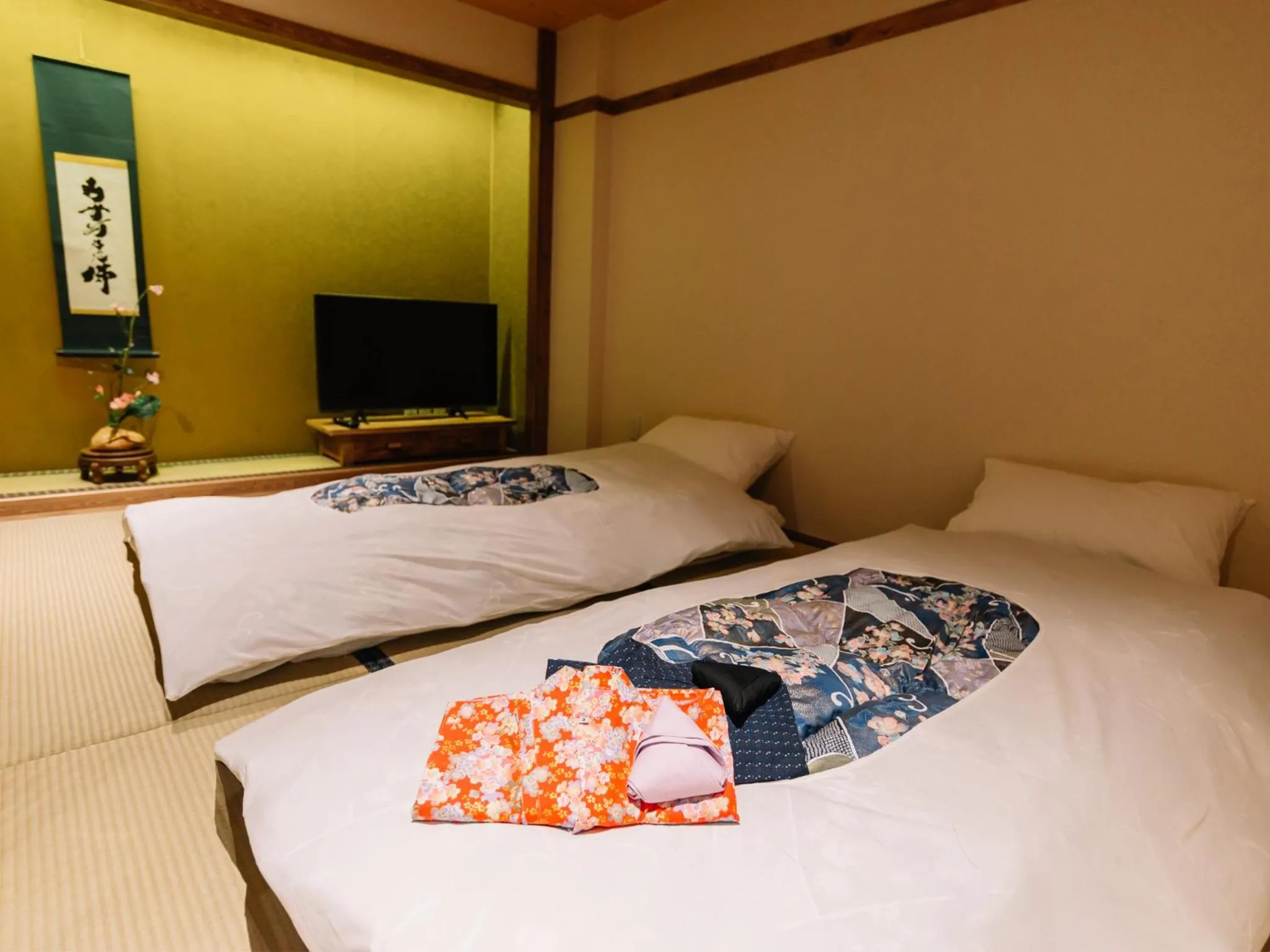 Bed in MAYU Bangkok Japanese Style Hotel