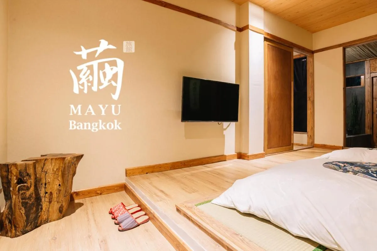 Bed in MAYU Bangkok Japanese Style Hotel