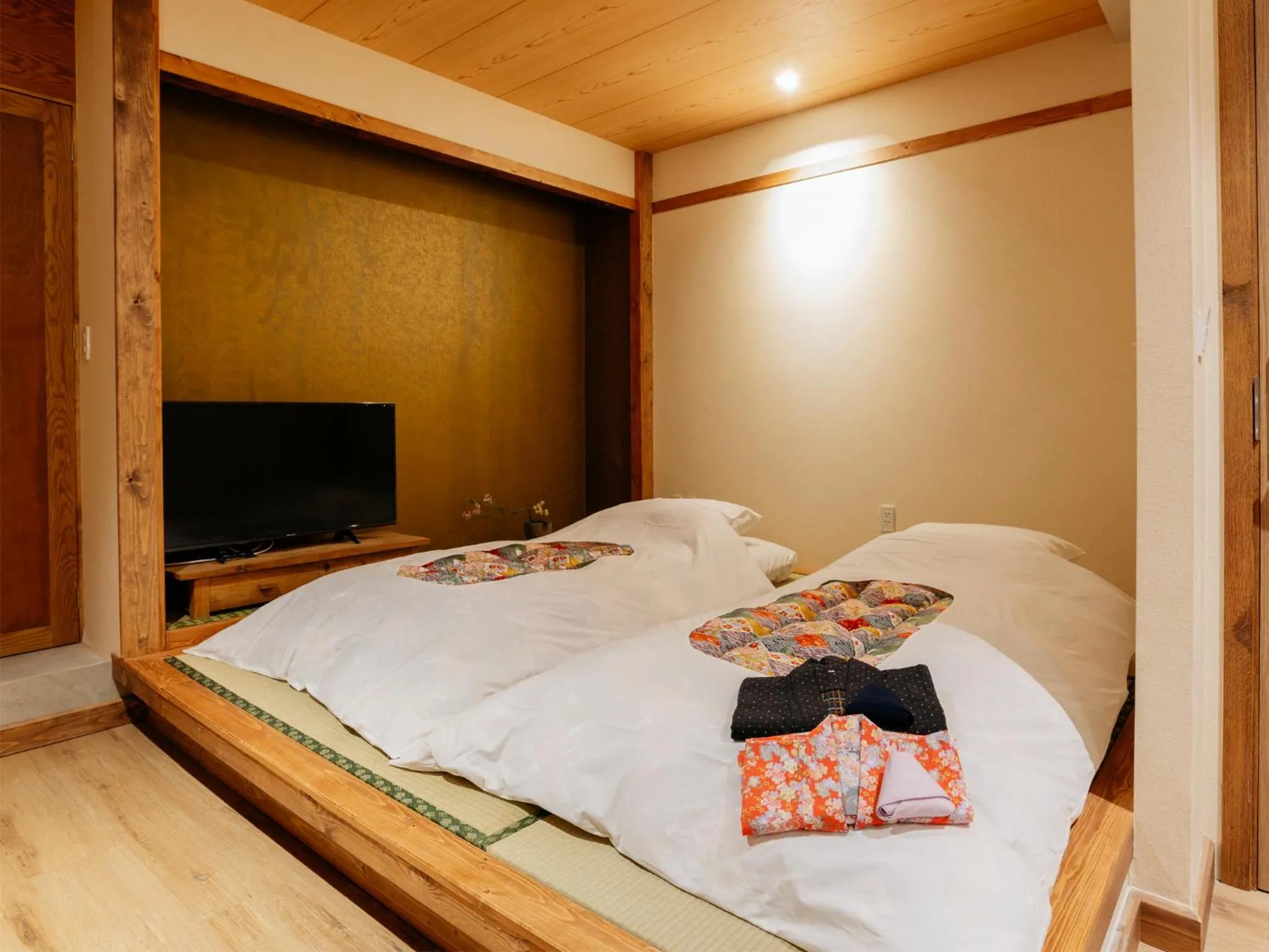 Bed in MAYU Bangkok Japanese Style Hotel