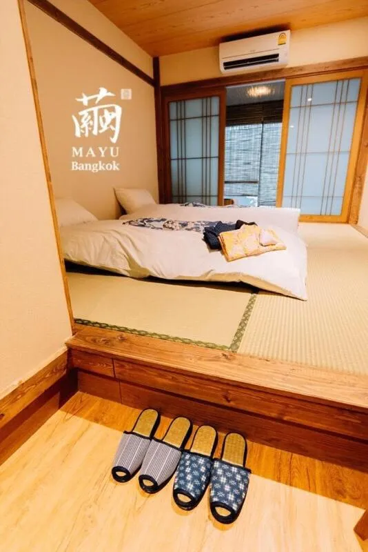 Bed in MAYU Bangkok Japanese Style Hotel