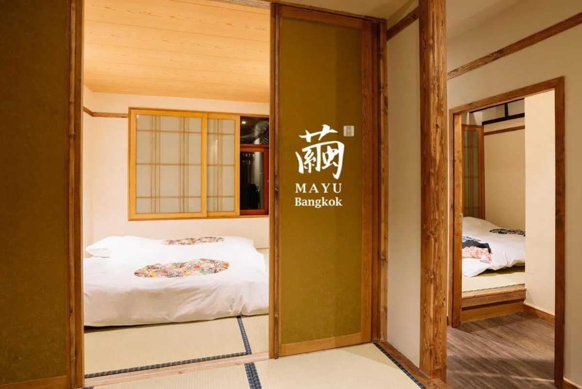 Bed in MAYU Bangkok Japanese Style Hotel