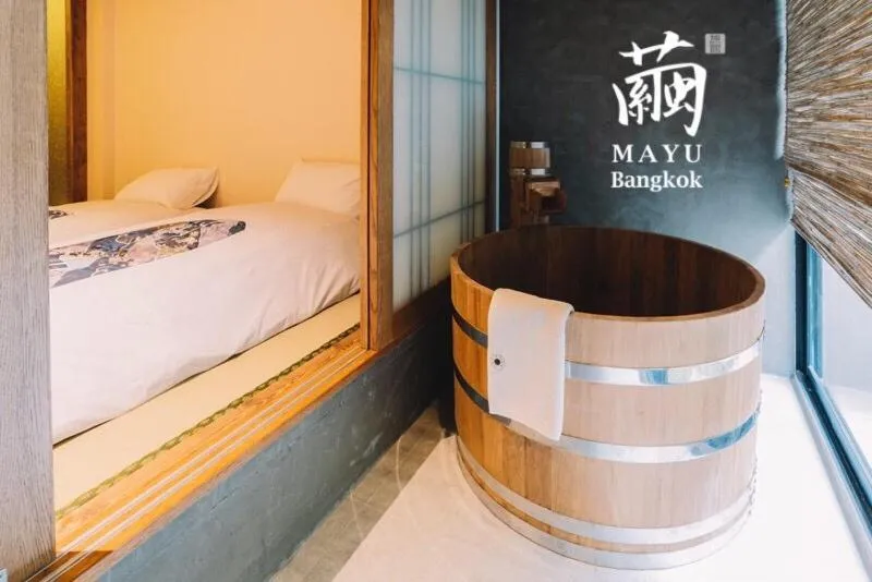 Bed in MAYU Bangkok Japanese Style Hotel