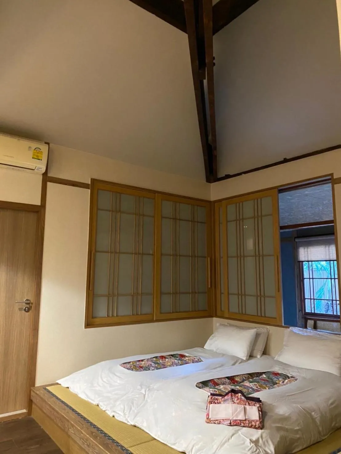 Bed in MAYU Bangkok Japanese Style Hotel
