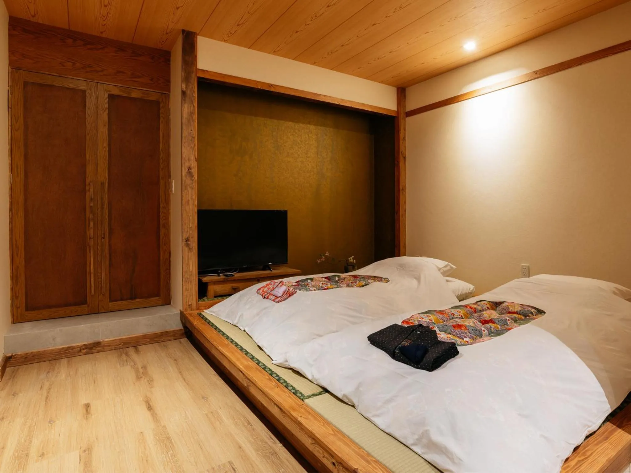 Bed in MAYU Bangkok Japanese Style Hotel
