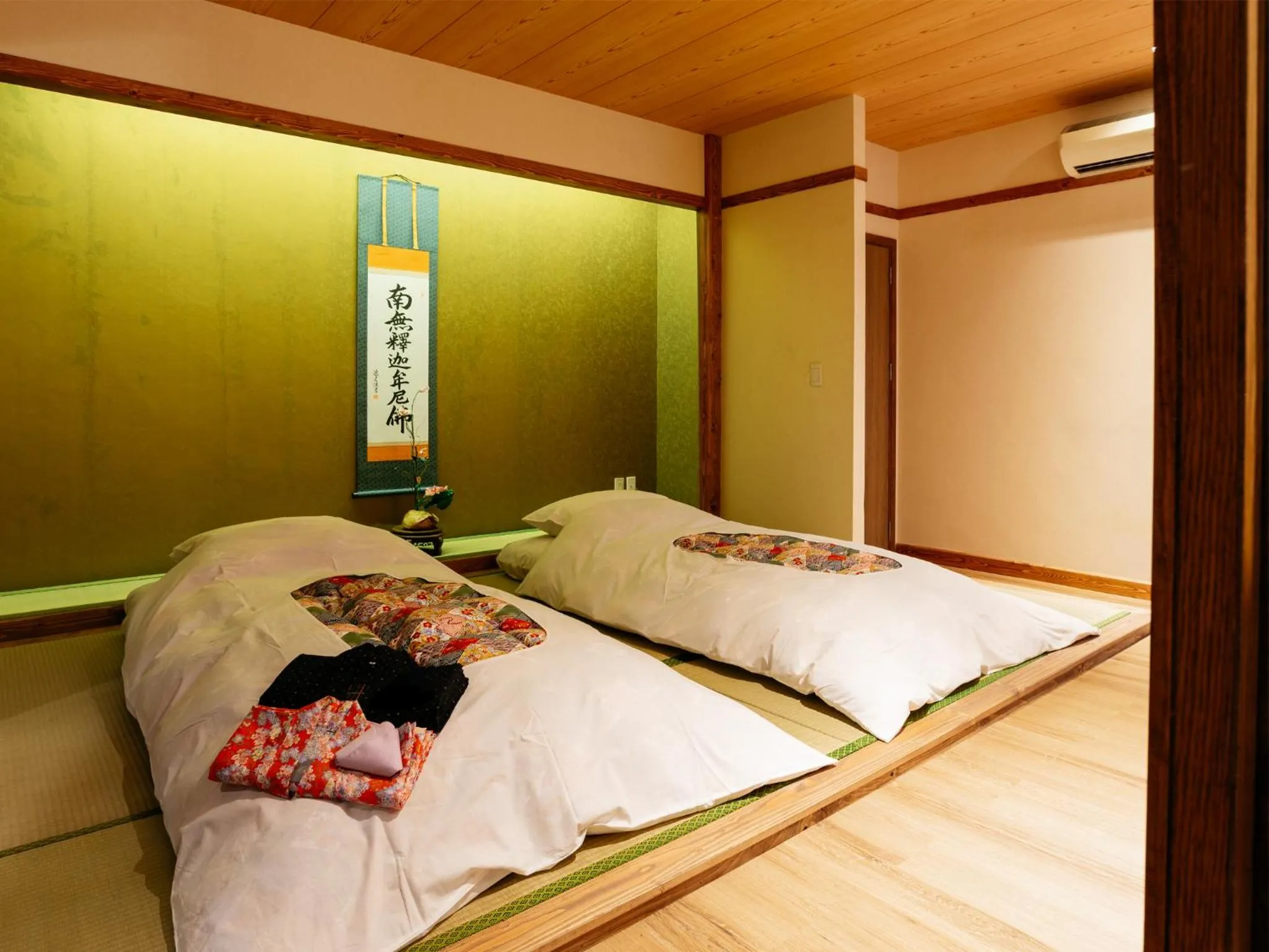 Bed in MAYU Bangkok Japanese Style Hotel