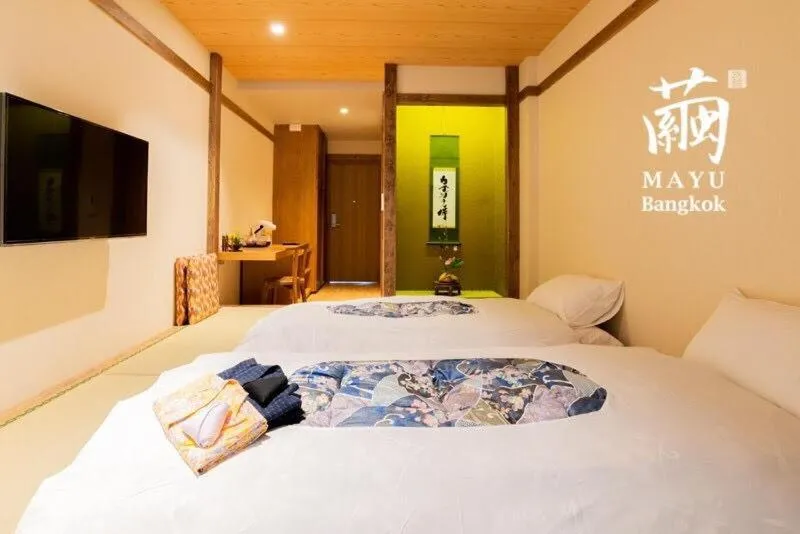 Bed in MAYU Bangkok Japanese Style Hotel