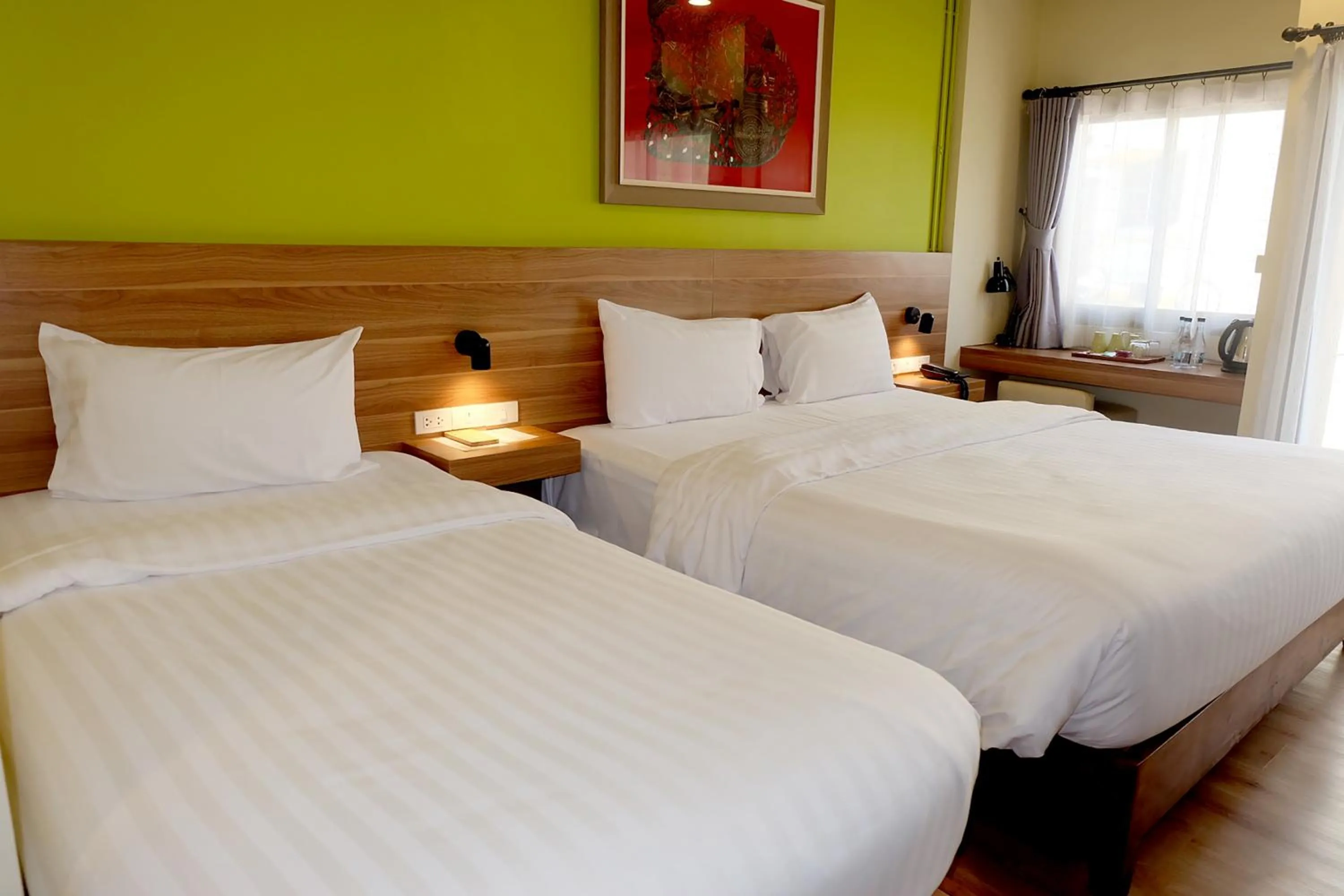 Bed in Siri Oriental Bangkok Hotel