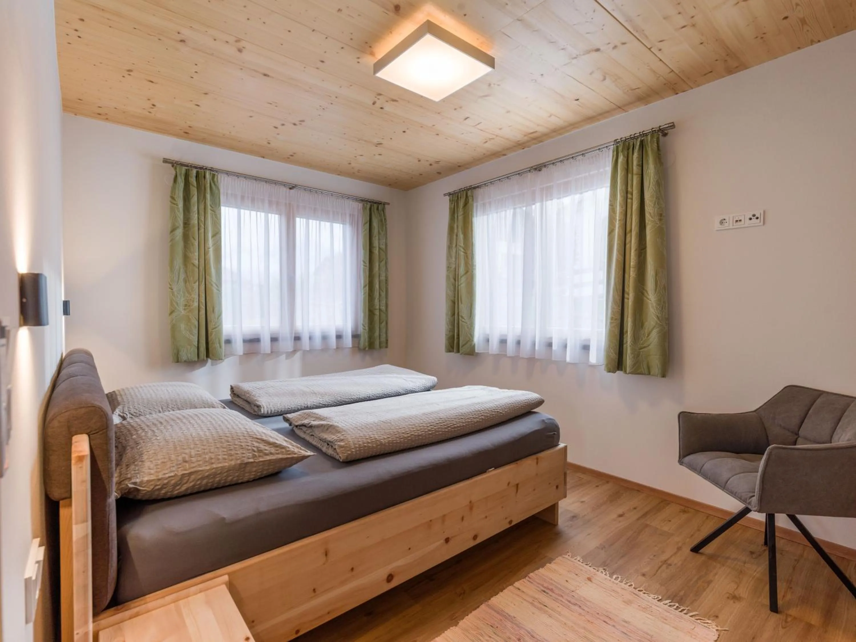 Bed in Hotel Baumgarten & Chalet Baumgarten