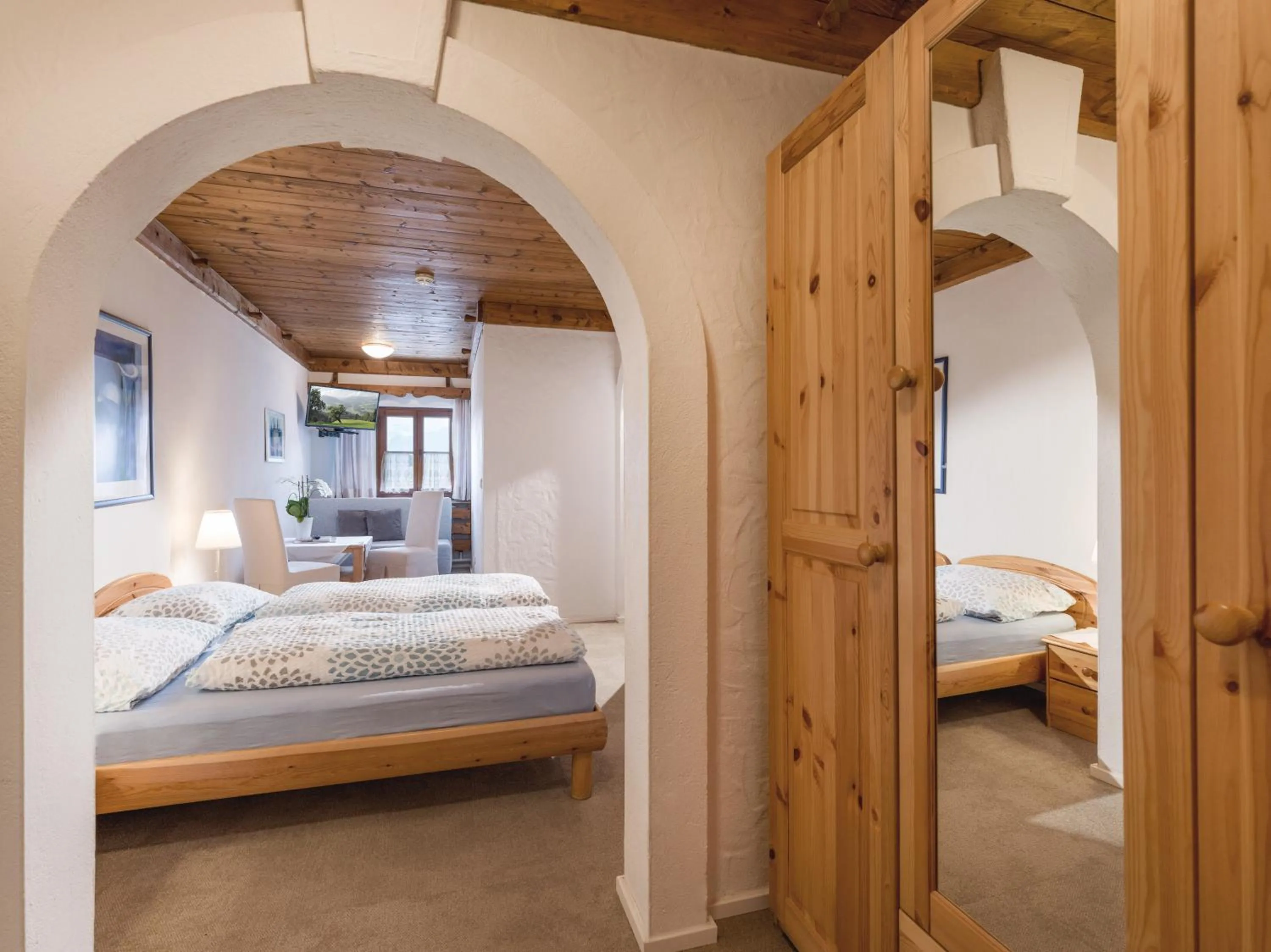 Photo of the whole room, Bed in Hotel Baumgarten & Chalet Baumgarten