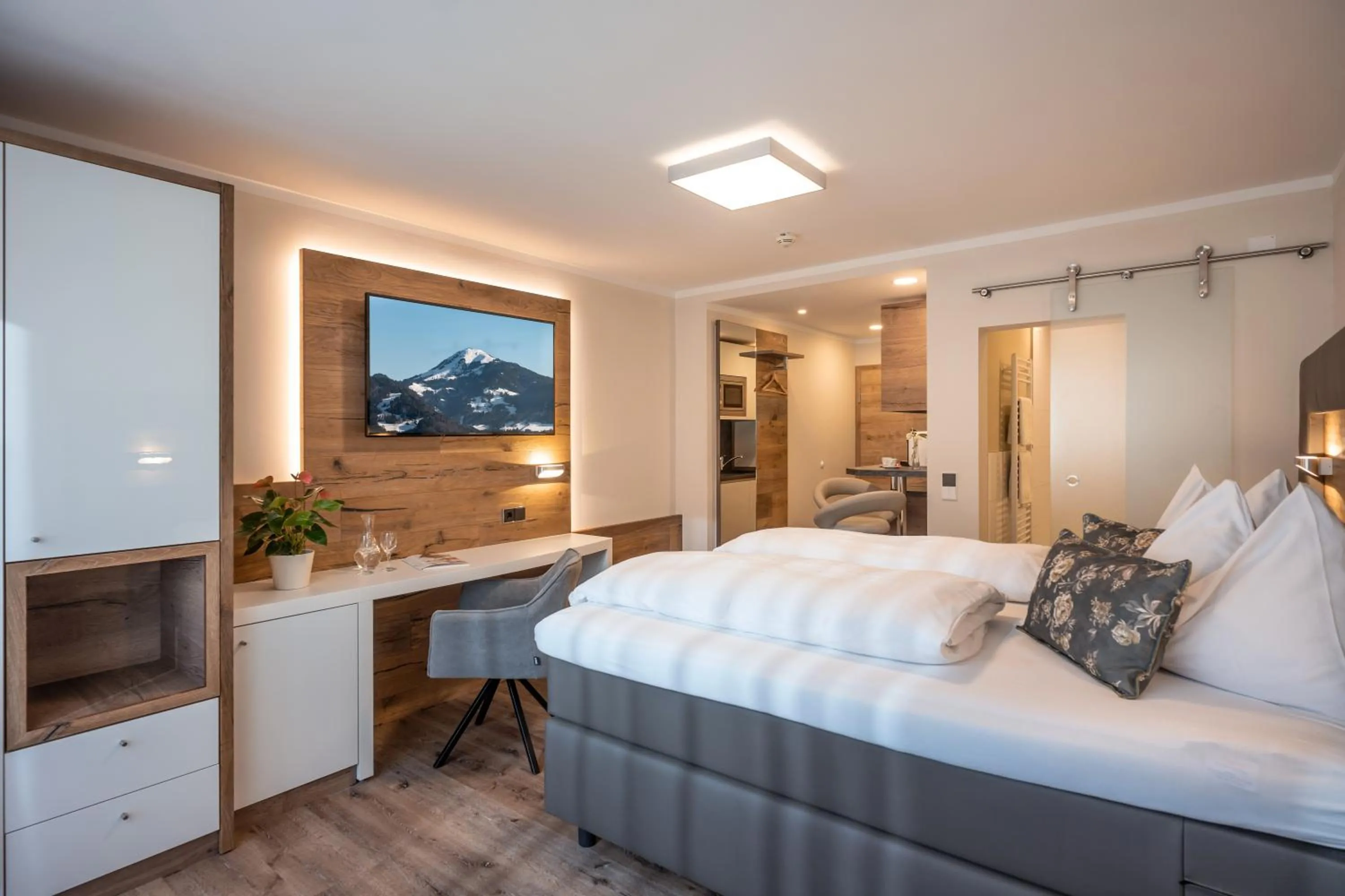 Photo of the whole room, Bed in Hotel Baumgarten & Chalet Baumgarten