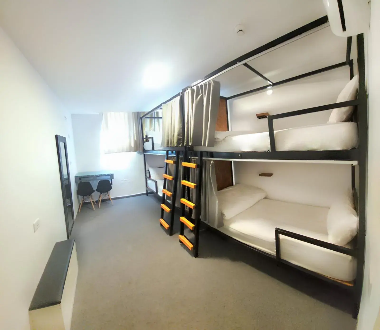 Bed in 4-Bed Mixed Dormitory Room in Nomads Hotel Bed in 4-Bed Mixed Dormitory Room in Nomads Hotel