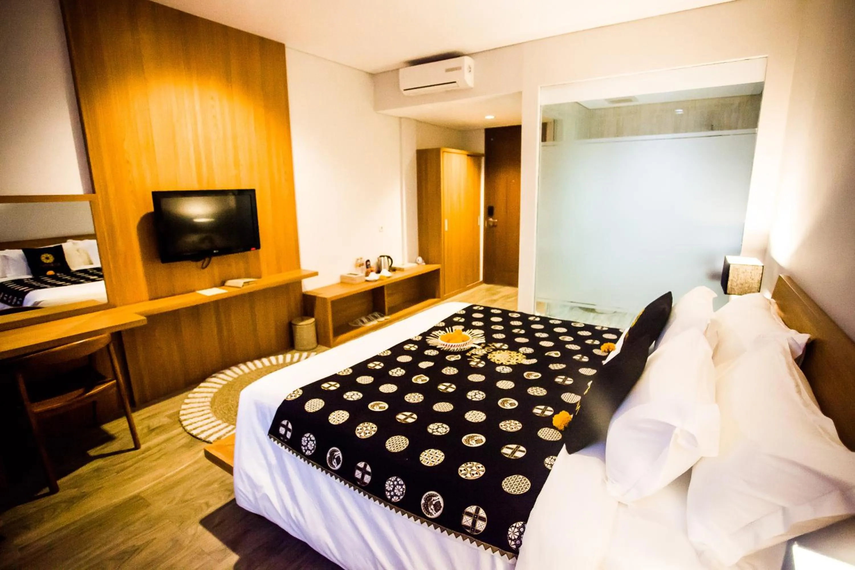 Bed in Freddies Resort & Villas Ubud by Kanaya Hospitality