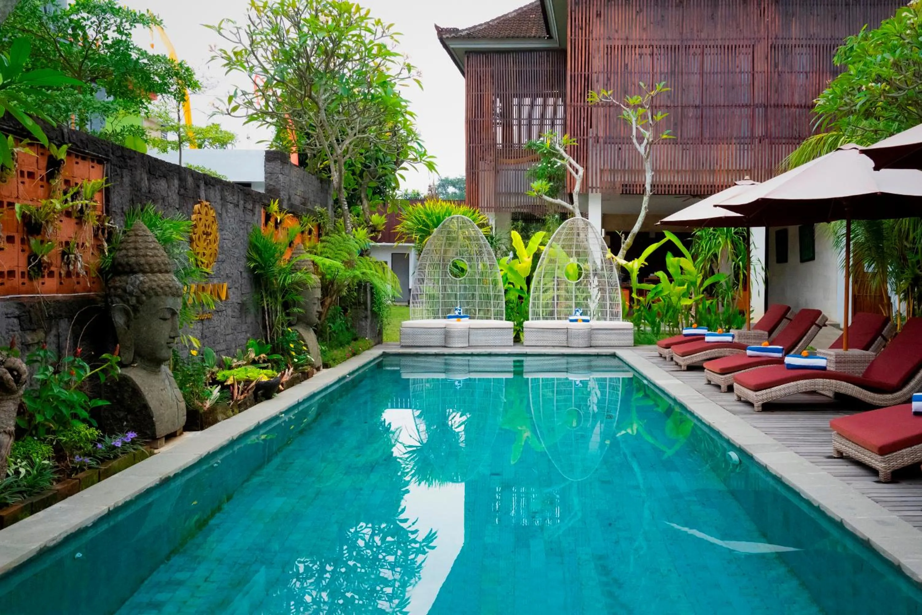 Swimming pool in Freddies Resort & Villas Ubud by Kanaya Hospitality