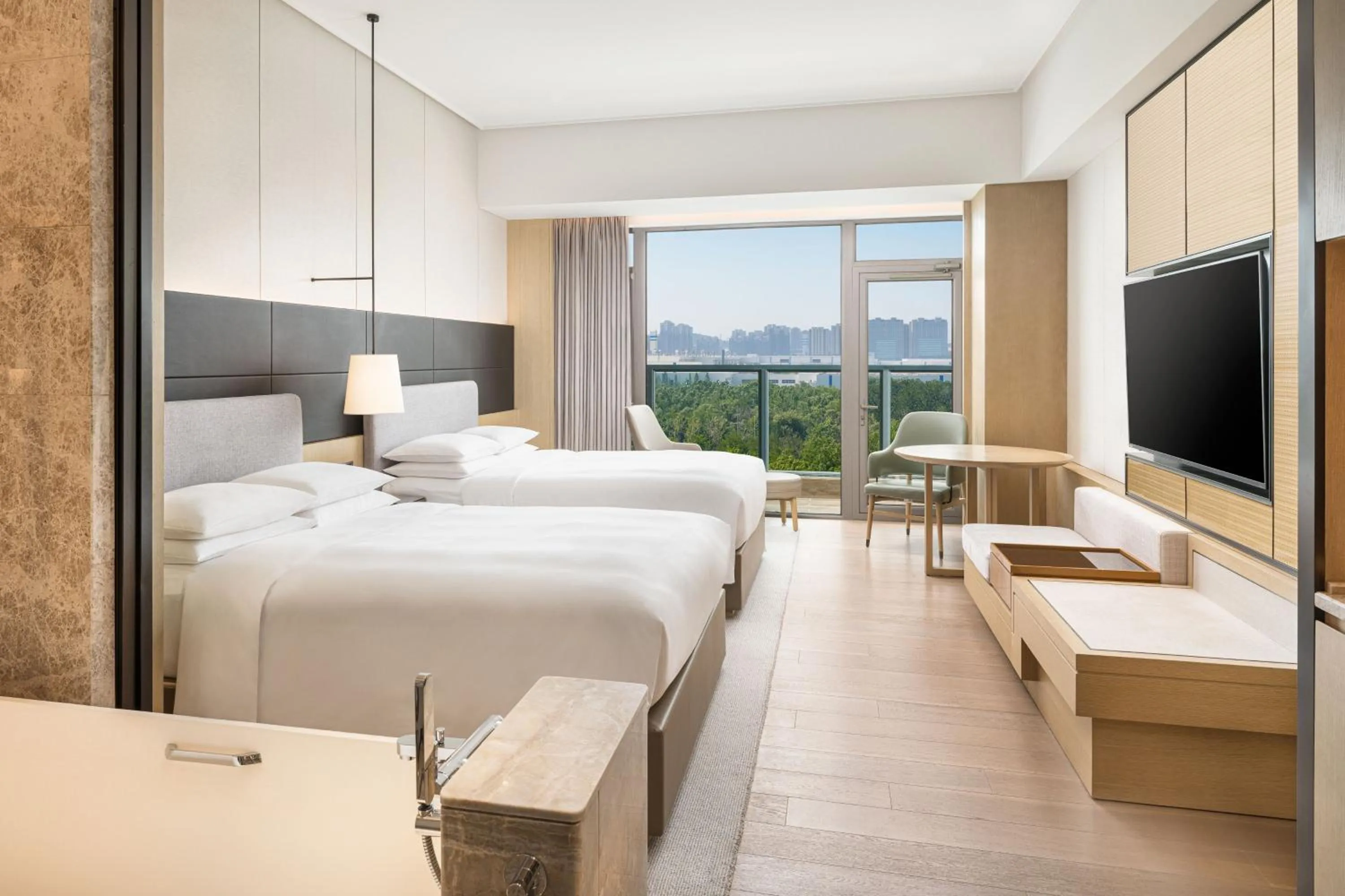 Photo of the whole room, Bed in Yantai Marriott Hotel