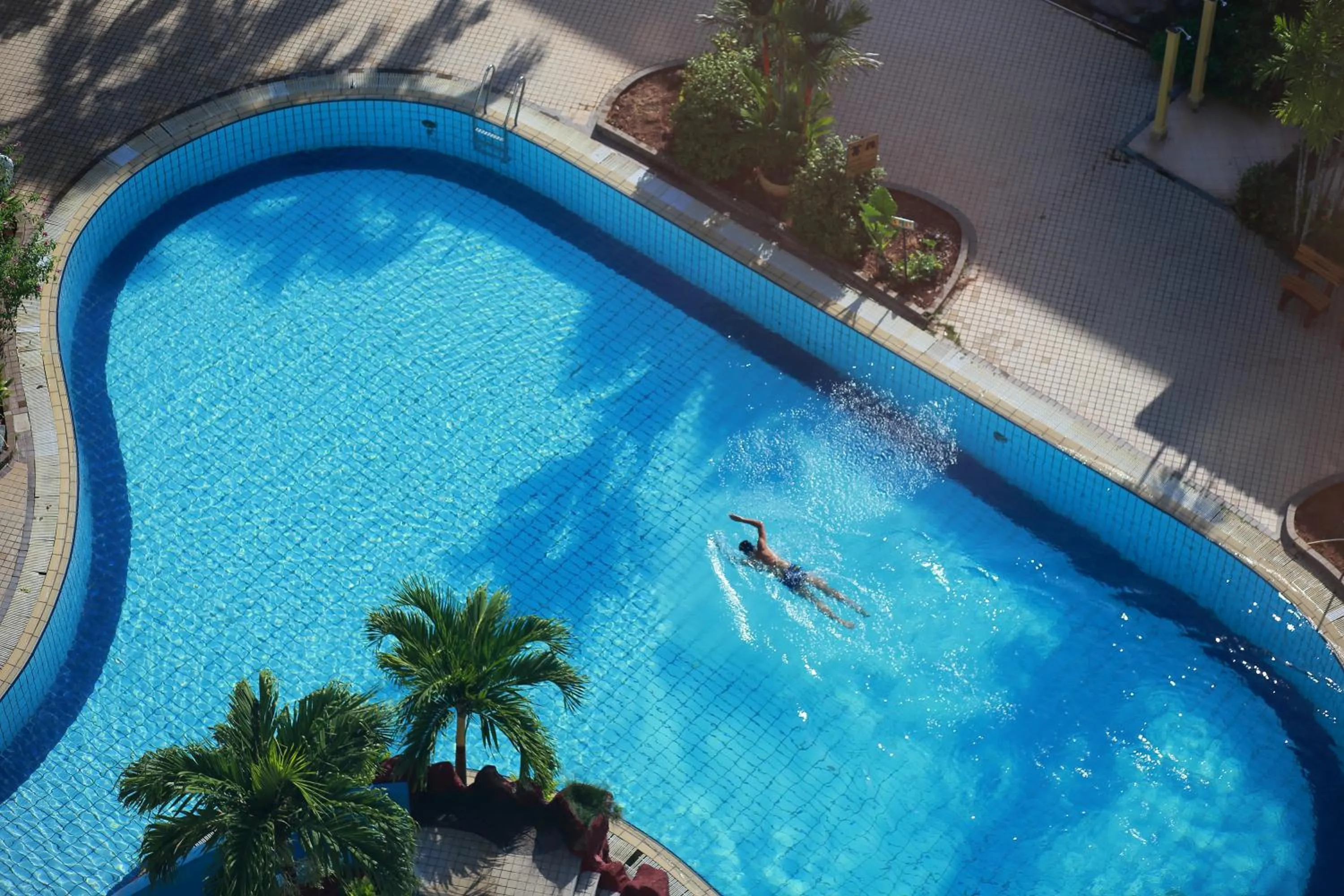 Swimming pool in The Putra Regency Hotel