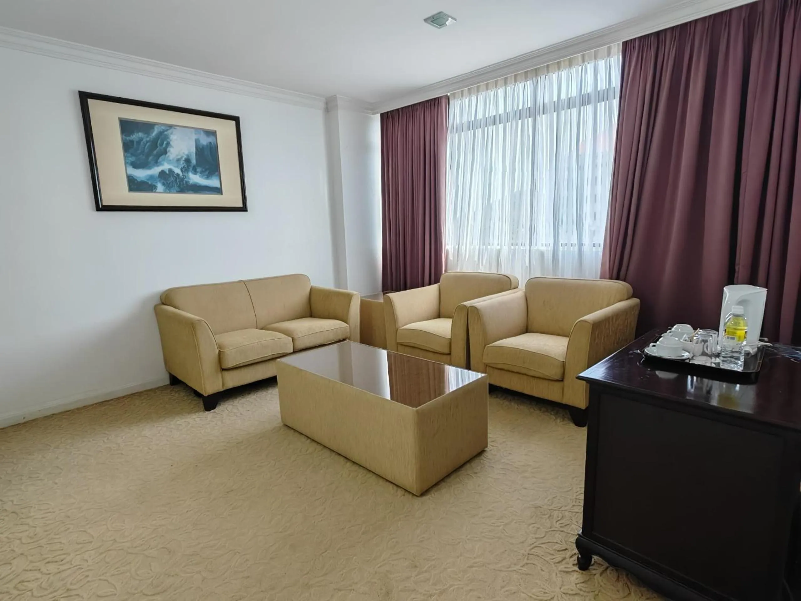 Living room in The Putra Regency Hotel