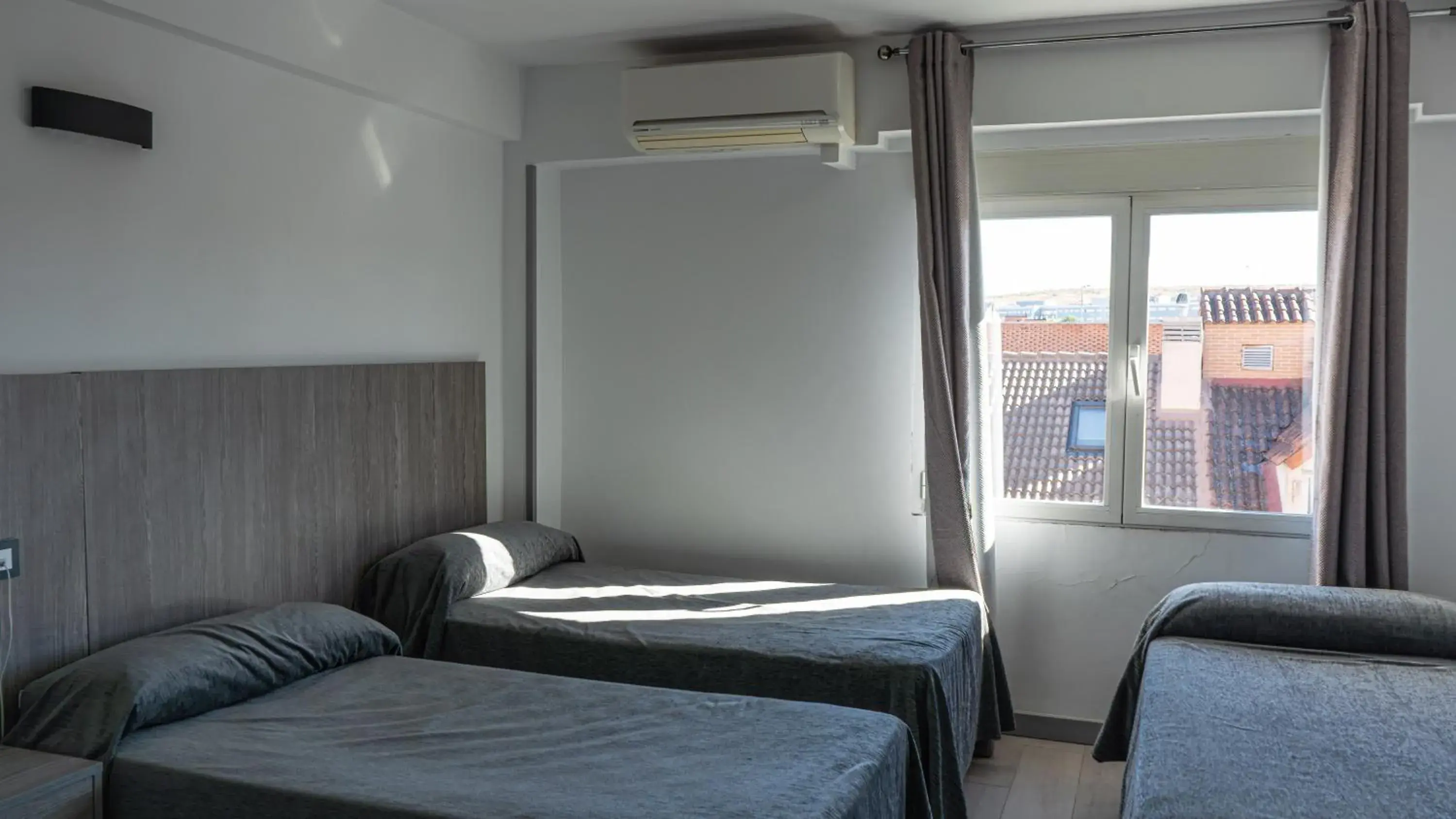 Triple Room in Hostal Goyma III Triple Room in Hostal Goyma III