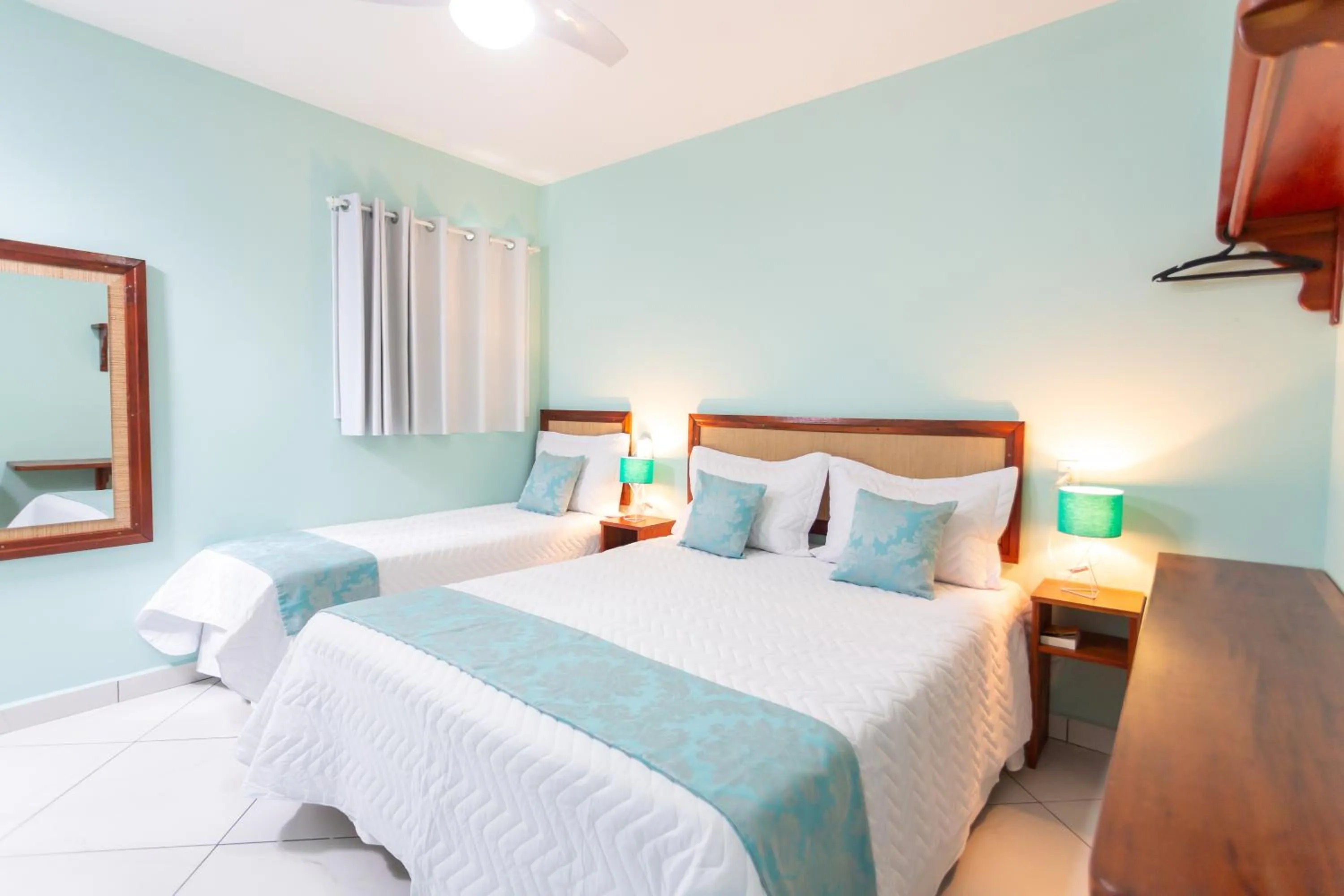 Bed in Pousada Pérola de Ubatuba