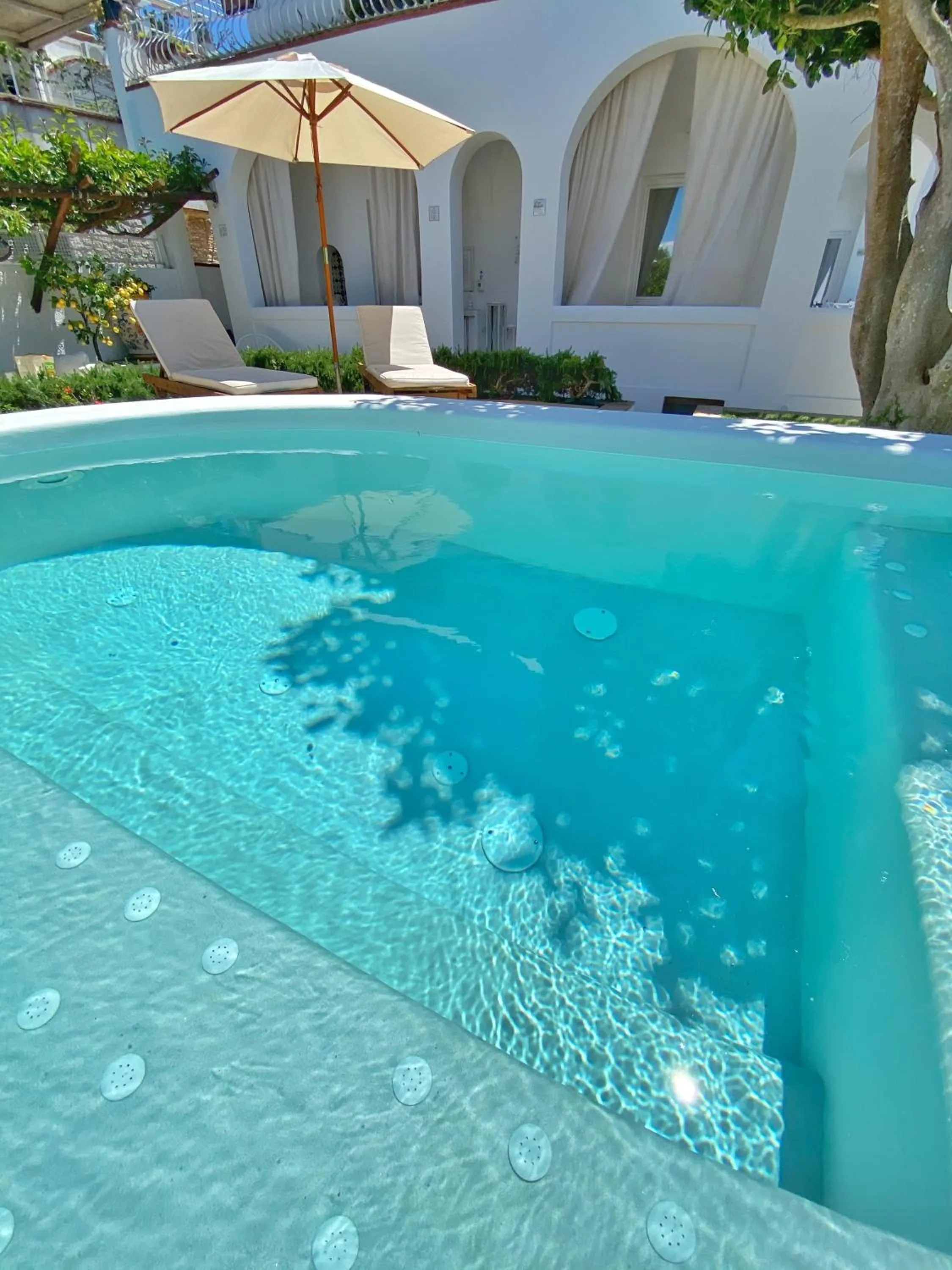 Swimming pool in La Giuliva Charming Rooms