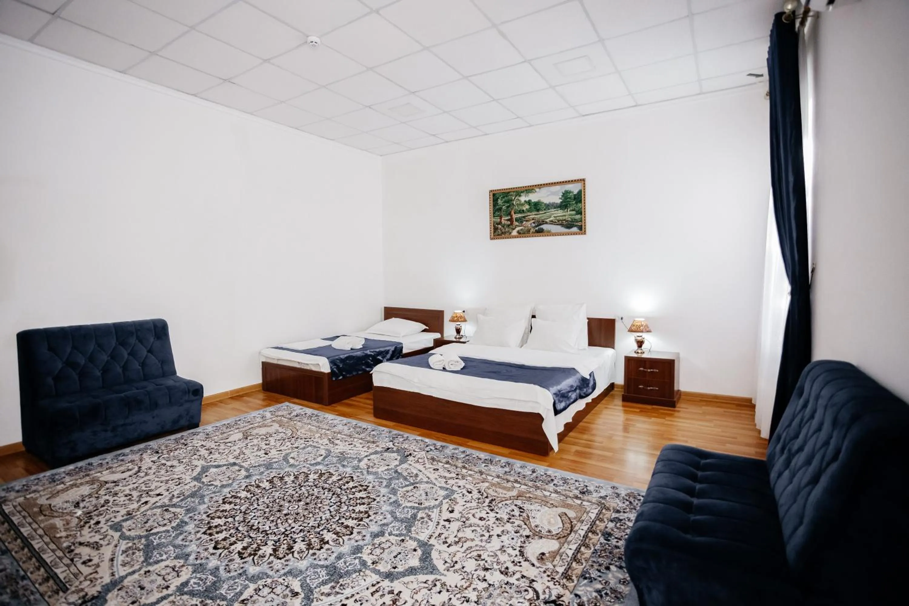 Bed in Karakalpak Palace Hotel