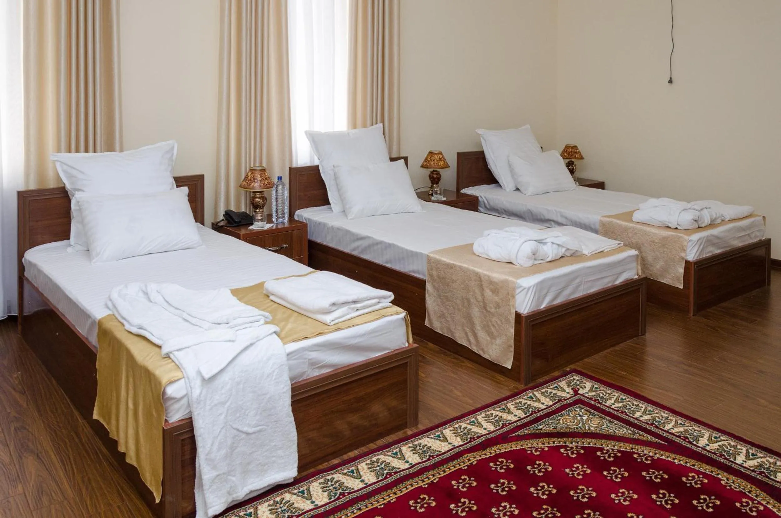 Bed in Karakalpak Palace Hotel