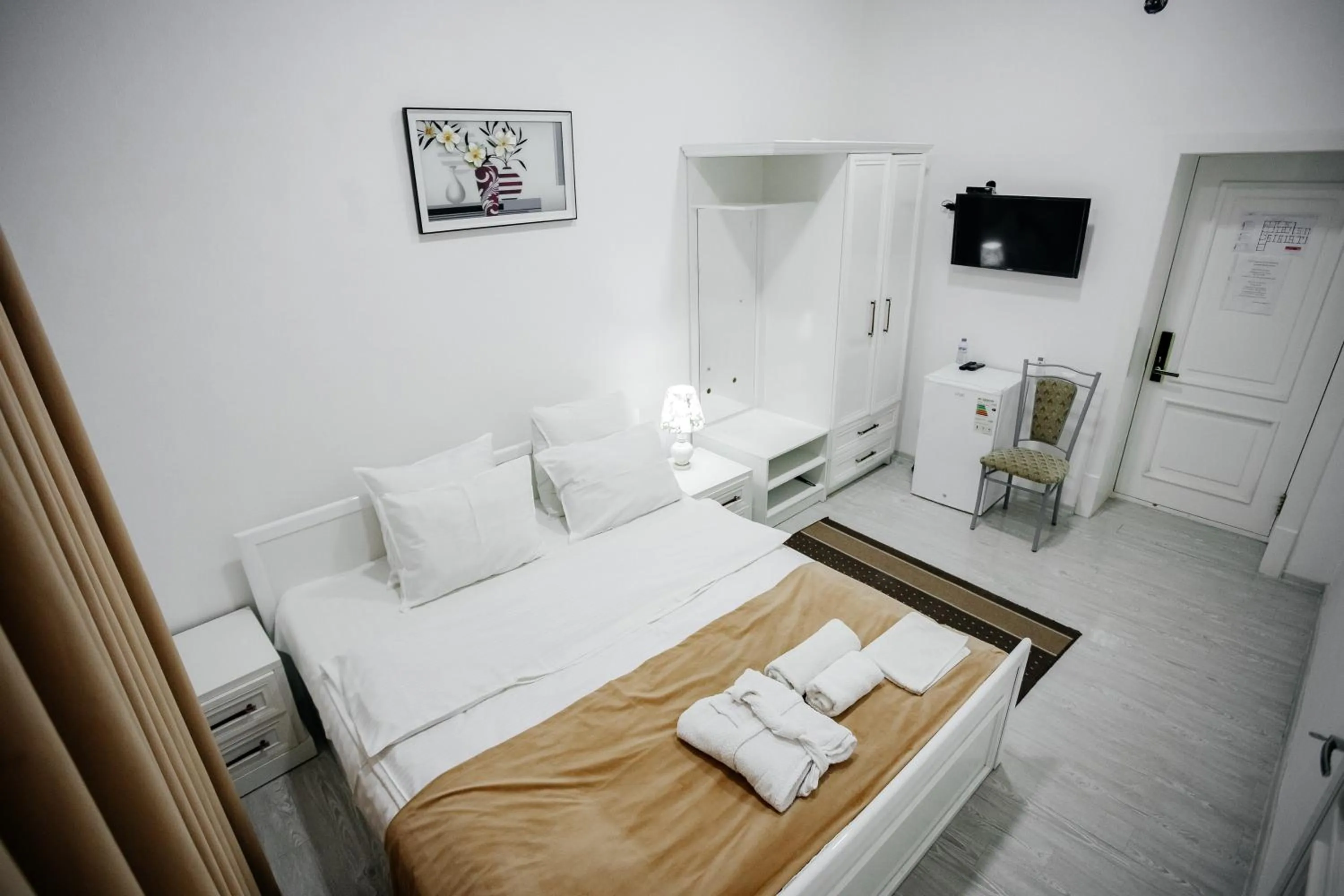 Bed in Karakalpak Palace Hotel