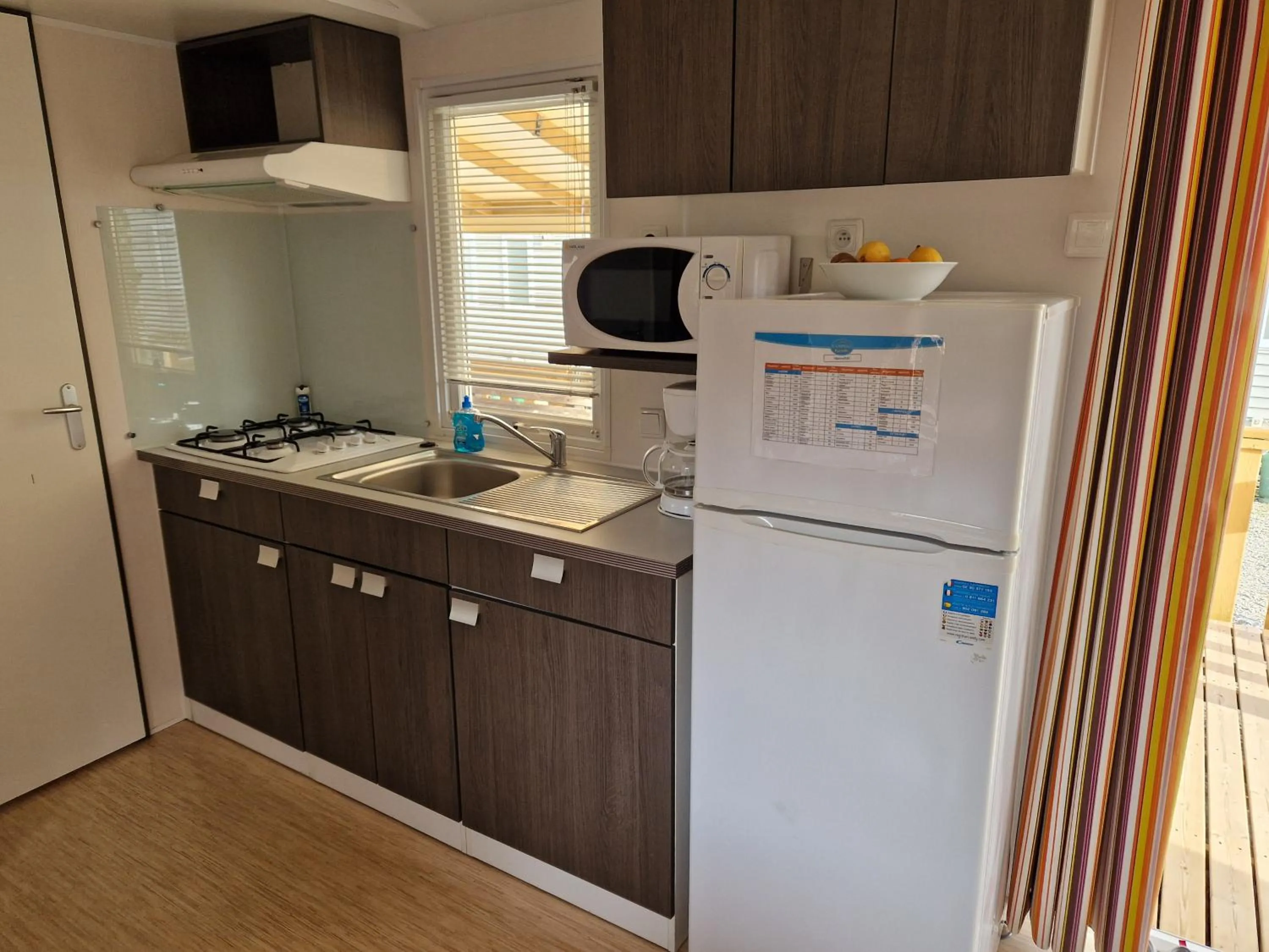 Kitchen or kitchenette in Camping Marmotel