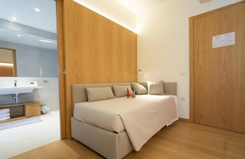 Photo of the whole room, Bed in Albergo Sorriso