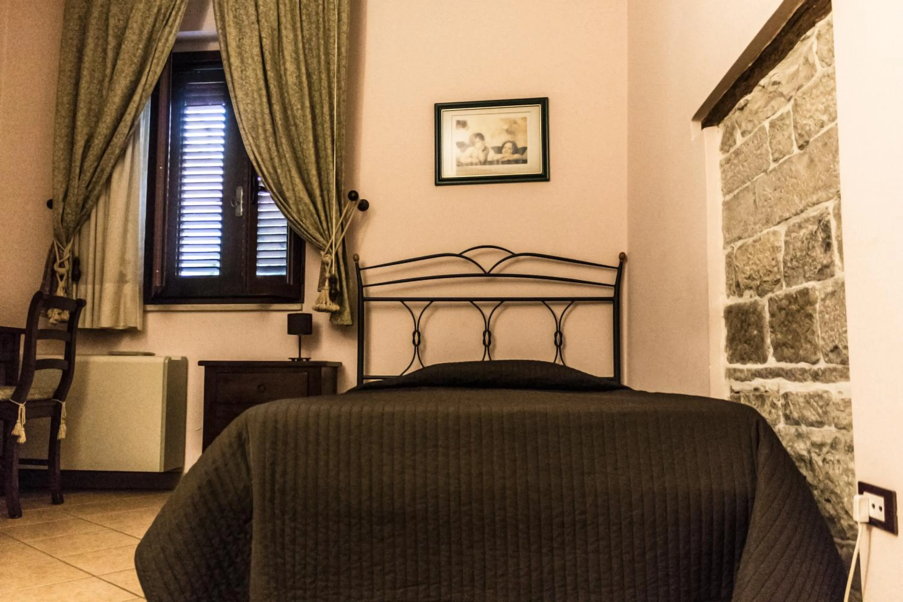 Decorative detail, Bed in B&B La Dimora