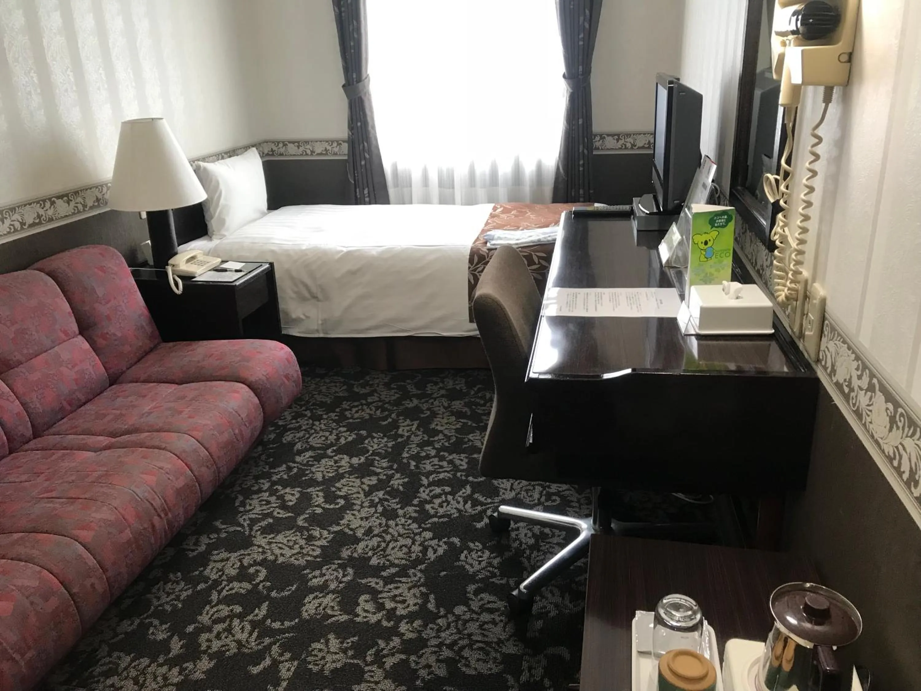 Living room, Bed in Hotel Crown Hills Kamaishi