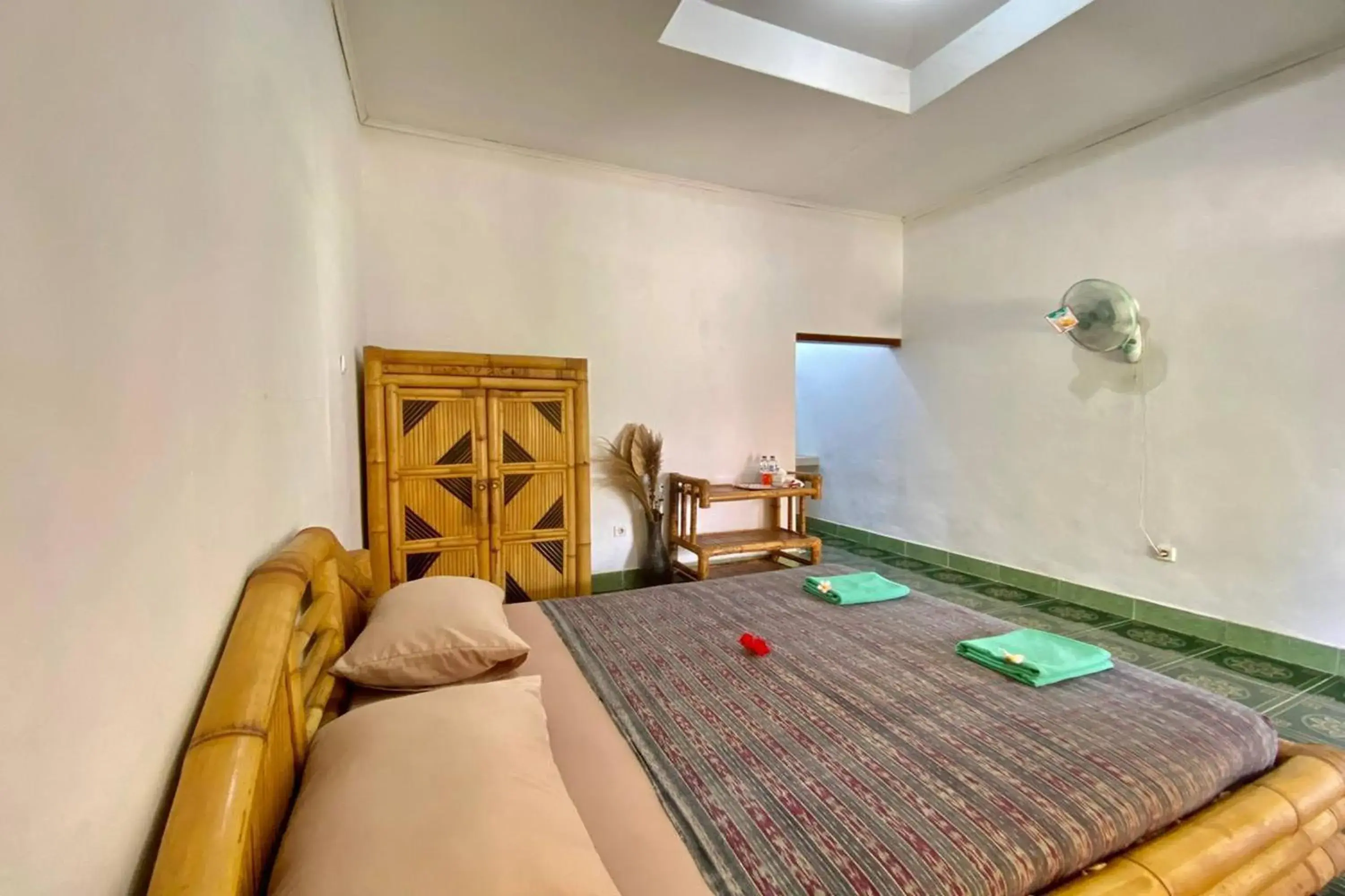 Bed in Duyung Rooms & Resto Gerupuk Bed in Duyung Rooms & Resto Gerupuk