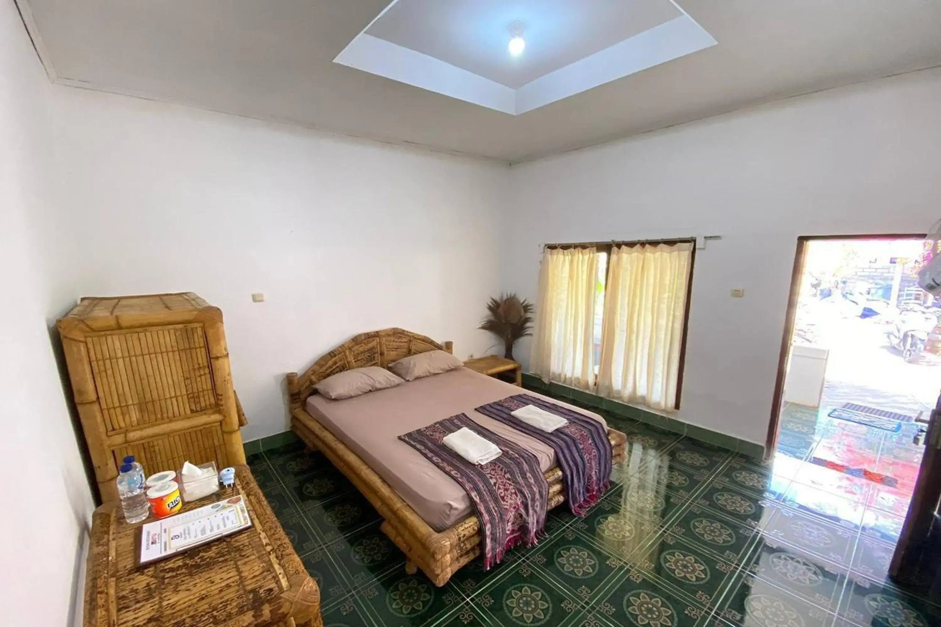 Bed in Duyung Rooms & Resto Gerupuk Bed in Duyung Rooms & Resto Gerupuk